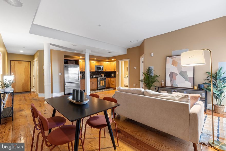 (Pet Friendly, Elevator Building with Extra Storage in basement) 
This spacious 1-bedroom, 1-bathroom condo combines modern comfort with vintage charm, featuring gorgeous exposed brick walls and beautifully refinished original plank hardwood floors. The open-concept living area showcases a sleek, chef-inspired kitchen with premium stainless steel Viking appliances. Thoughtfully designed, the unit offers ample closet space, in-unit washer and dryer, and additional storage in the basement.  Added unit features include electric blinds, built-in entertainment speakers, custom closet shelves and track lighting throughout.  Originally a factory, the Winne Building has been reimagined as a collection of luxury condos on historic Front Street. The building has a secure entrance, large lobby, and elevator. Just steps away from premier restaurants, charming shops, and the historic Old City, it’s also a short walk to iconic attractions like Independence Mall, Penn’s Landing, and Spruce Street Harbor Park, which hosts year-round events and entertainment. Convenient access to I-95, I-676, and South Jersey makes commuting a breeze, and there are nearby parking garages for added convenience.