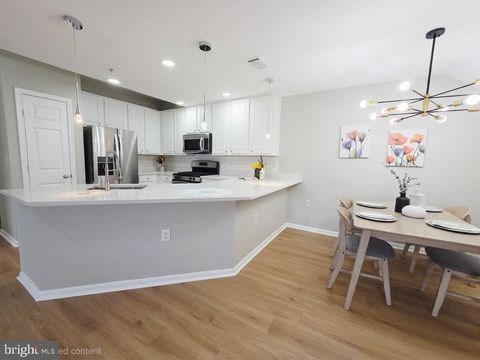 Photo of 11345 Aristotle Drive #6-410, FAIRFAX, VA 22030 (MLS # VAFX2310388)