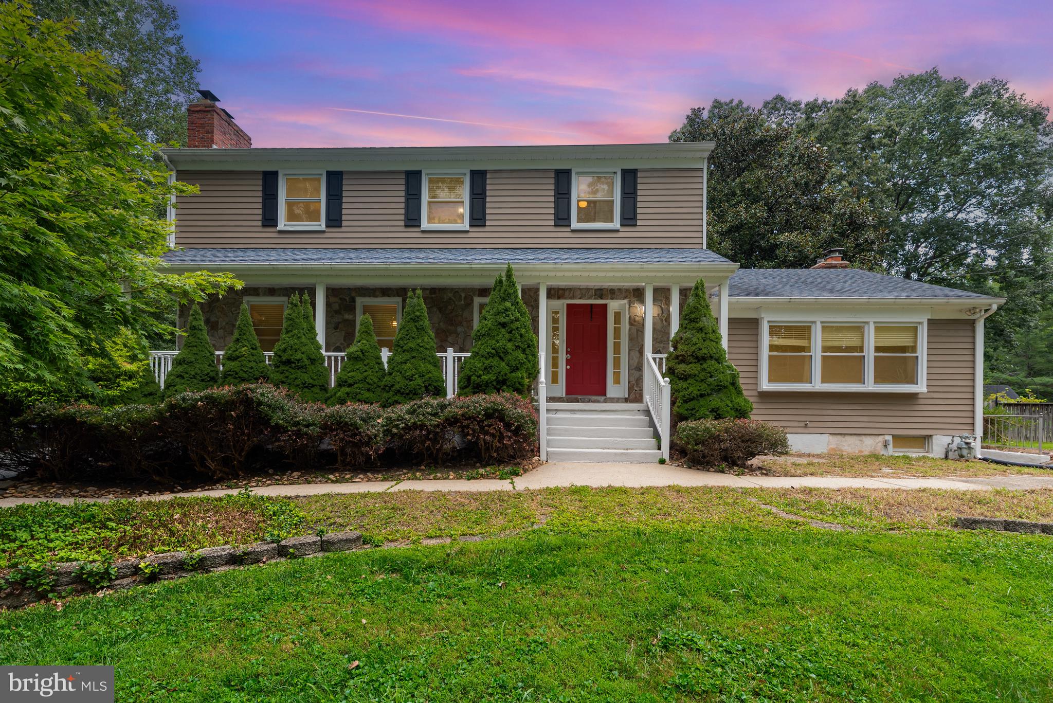 This charming colonial home, located in the heart of Perry Hall, offers a unique country setting on 1.67 acres of land. With approximately 1 acre cleared and 0.67 acre wooded, it provides a serene environment within walking distance to Gunpowder Falls.
Home Features
The home features four spacious bedrooms, two full bathrooms upstairs, and a convenient powder room on the main level.
The living room is highlighted by a wood-burning fireplace with a mantle, providing warmth and ambience on chilly evenings. The formal dining room, featuring sliding glass doors to a newly added deck, is ideal for entertaining. The gourmet kitchen is equipped with cherry cabinets, granite countertops, and a center island with a cooktop.
The family room, located off the kitchen, is an expansive space that includes a second wood-burning fireplace, built-in shelving, bookcases, and closets for storage.
A bonus for this home is the generous-sized sunroom featuring cathedral ceilings, tiled flooring, a kitchen pass-through, French door to the kitchen, and a sliding glass door to the deck. A pellet stove offers heat to this room combining efficiency and convenience.
A decorative staircase in the foyer leads to the four bedrooms and two full bathrooms upstairs. The primary bedroom is a cozy retreat with a third wood-burning fireplace and a newly renovated bath.
Hardwood flooring, chair molding, and picture frame molding throughout this house adds to the home's charm.
Additional Spaces
The partial basement includes a finished multi-functional room suitable for an exercise room, office, or playroom, along with additional storage space, a walkout, and a washer and dryer.
Outdoor Features
Enjoy outdoor activities on the newly replaced deck and a level, fenced lot. Relax on the covered front porch. The property includes a private driveway with ample parking and a backyard shed for storage.
Utilities and Maintenance
The roof is approximately 15 years old. The HVAC system is a Lennox system, approximately 8 years old, and the water heater was installed within the last 3 years. A whole house generator is included.
This home offers the perfect blend of convenience and privacy, allowing you to enjoy the best of both worlds in Perry Hall.