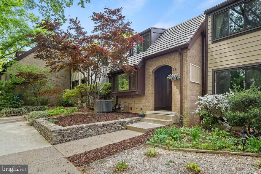 Open Houses Canceled- Welcome to this beautifully presented four-bedroom home in the highly sought-after neighborhood of Bentana Woods, Reston. Boasting 2000 sq ft of thoughtfully designed living space, this home offers a perfect blend of comfort and charm. The open-plan kitchen and dining area flow seamlessly into a cozy living room, just a few steps down, featuring direct access to a private back deck surrounded by mature trees—ideal for relaxing or entertaining. Upstairs, you’ll find three bedrooms and two well-appointed bathrooms. The lower level offers a fourth bedroom with elegant French doors opening onto a serene patio, providing excellent natural light and privacy—perfect for guests or a home office. Wine enthusiasts will appreciate the custom wine room in the basement, with capacity for up to 900 bottles. Additional conveniences include assigned parking for two cars and only 5 mins drive from Wiehle Metro. Don’t miss this rare opportunity to live in one of Reston’s most desirable locations.