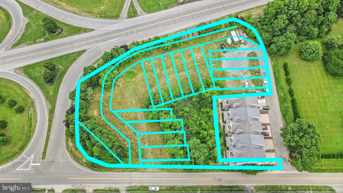 ABSOLUTE ONLINE REAL ESTATE AUCTION TO THE HIGHEST BIDDER OVER $100,000!! Online Bidding Opens - Monday, May 19, 2025. Online Bidding Closes - Wednesday, May 21, 2025 at 1:00 PM. List price is opening bid only. Bridgepoint Town Homes (a/k/a Bridge Point) is a nineteen unit subdivision, located just south of the Chesapeake City C&D Canal Bridge. Five townhomes have been constructed. The auction property includes fourteen townhouse lots, four open-space parcels, extensive drawings, plats, storm water management and engineering plans, prepared by Morris & Ritchie Associates, Inc. Four prepaid water and sewer hook-ups, worth $60,000, are also included. The property is sold to the highest bidder above $100,000.
Bridgepoint Townhomes comprises approximately 2.13 acres of level land, subdivided into nineteen townhouse lots, and open space parcels, situated along Nicholas Loop. Townhouses on Lots 1-5 were completed in 2010. The development fronts on Basil Avenue and MD-213 (Augustine Herman Highway).
The auction includes Lots 6-19 and Open Space Parcels A, B, C and D, as shown on the record plat, recorded among the Land Records of Cecil County in Plat Book PC No. 1111, folio 85.
The townhouse lots are 22′ wide, by depths ranging from approximately 110′ to 141′. Public water and sewer are available and four lots have prepaid hook-ups.