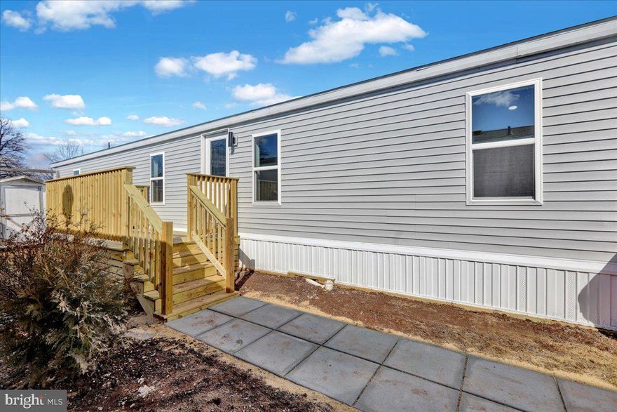 Step into this beautifully renovated mobile home, where modern updates and thoughtful design create a fresh, inviting space. From the moment you walk in, you'll notice the attention to detail, with stylish finishes and a warm, welcoming feel.  Offering a bright and airy atmosphere perfect for relaxing or entertaining. With a completely refreshed interior and exterior, including a brand-new kitchen, updated comfort features, bathroom and much more! This home is truly move-in ready. Enjoy peaceful mornings on the new deck and the convenience of a low-maintenance lifestyle. Don't miss this opportunity to own a home that feels brand new! Mobile home community- Neighbors at Creek view Court, Lot rent $825. Reach out today to set up your showing!