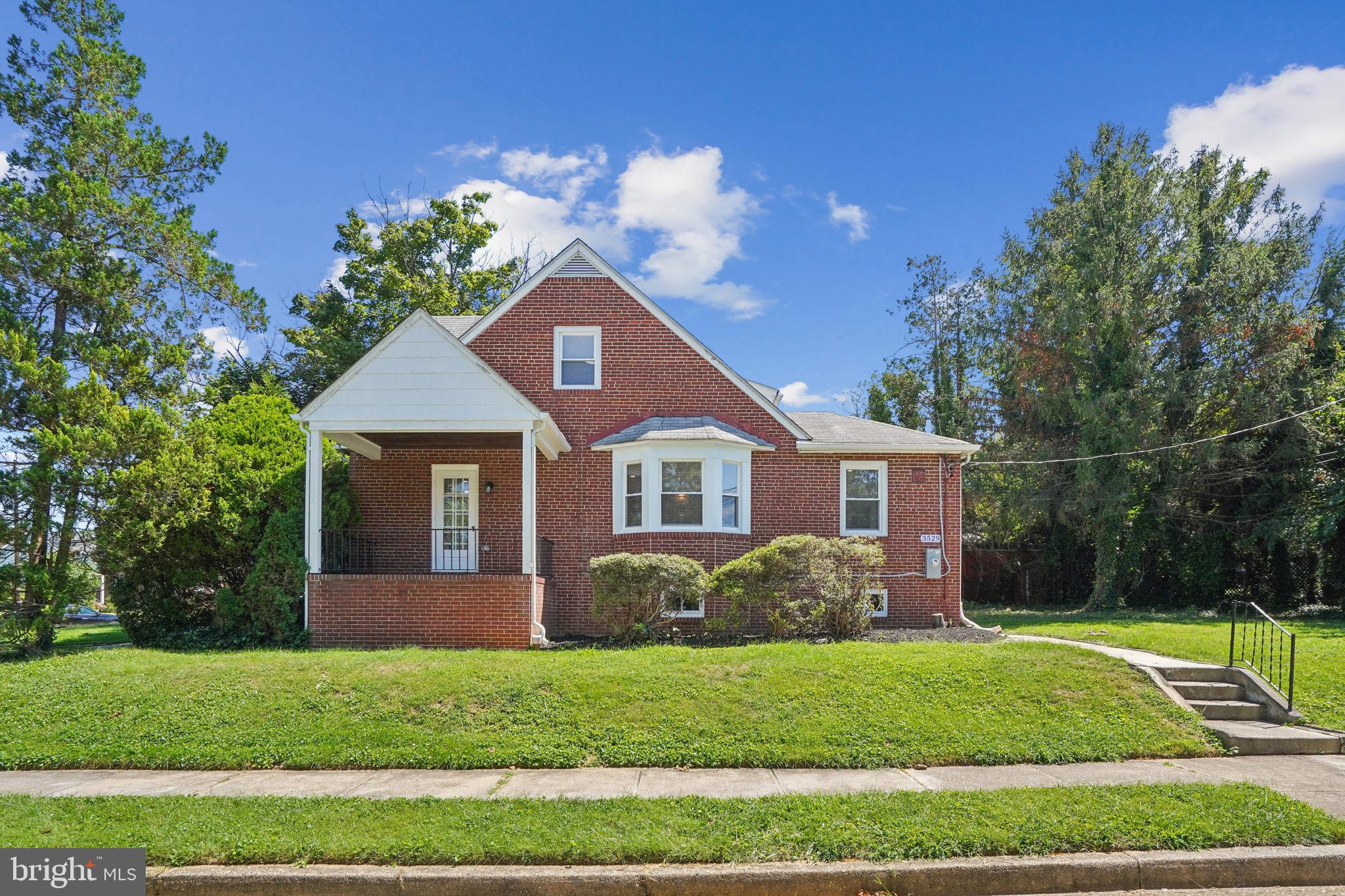 Welcome to 3529 Glenmore Ave, a beautifully renovated brick Cape Cod in Northeast Baltimore offering 4 spacious bedrooms, 3 full baths, and 1 half bath. This home has just completed a six-month transformation featuring luxurious upgrades throughout including a brand-new open-concept kitchen with granite counters, stainless steel appliances, custom cabinetry, and tile flooring; a newly added upstairs bathroom creating a true primary bedroom retreat; fully remodeled bathrooms with decorative tile surrounds, stone vanities, and modern fixtures; and a finished basement reimagined as a club room with a half bath, laundry area, and utility space. The home also boasts a high-efficiency forced air HVAC system, upgraded 200 AMP electrical service with new panel and safety-compliant detectors, refreshed plumbing, and all-new interior surfaces including refinished hardwood floors, fresh paint, and updated lighting. Exterior improvements include all-new windows and doors, enhanced landscaping, and improved curb appeal—making this turnkey home ready for you to move in and start making memories.