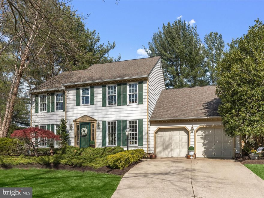 Tucked in a quiet cul-de-sac, this beautifully maintained colonial offers nearly 4,000 square feet of inviting living space, an incredible wooded setting, and thoughtful updates throughout. Highlights include a fully renovated primary bath, gleaming hardwood floors, a fenced backyard retreat, and a screened porch that looks out over the serene landscape. This home welcomes you with a light-filled foyer that sets the tone for the warmth and elegance found throughout. To the right, a private study with French doors provides a quiet workspace, while to the left, the formal living and dining rooms impress with rich crown molding and a gracious flow ideal for entertaining. The heart of the home is the expansive kitchen, where a center island, stainless steel appliances including a gas range with a warming drawer and convection microwave, and a spacious pantry cater to both everyday meals and special gatherings. The adjoining breakfast area looks out over the peaceful backyard, and just beyond, the family room stuns with a vaulted ceiling, skylights, and a floor-to-ceiling white brick wood-burning fireplace. A glass-paneled atrium door opens to the screened porch with a cathedral ceiling, a perfect perch for enjoying the natural beauty that surrounds the home.
Upstairs, hardwood flooring runs through the hallway and into the primary bedroom featuring a soaring cathedral ceiling, a sitting area, a walk-in closet plus a second closet, and a luxurious renovated en-suite bath. This spa-like retreat includes a double vanity, freestanding soaking tub, and jetted tile shower with frameless glass. Three additional bedrooms share a well-appointed full bath. The finished lower level adds even more living space with a family room, a bonus room with an attached full bath, and a large storage room that also offers space for use as a workshop. Walkout stairs lead to the fenced backyard where you'll find a beautifully hardscaped stone patio, along with a second stone patio with firepit connected by a charming stone walkway perfect for relaxing or entertaining under the stars. Additional updates and features include new windows throughout, basement carpeting, storm doors, ceiling fans, a natural gas line brought to the home, and key appliance upgrades such as the washer, dryer, refrigerator, dishwasher, and gas range. The chimney has been enhanced with a stainless steel insert and cap, and the backyard has been thoughtfully fenced and landscaped for beauty and privacy. Nature lovers will appreciate the nearby trails, while commuters will enjoy easy access to BWI Airport, I-95, and major hubs including Baltimore and Washington DC. With shopping and CPRA pool access close by, this home offers a seamless blend of peaceful retreat and everyday convenience.