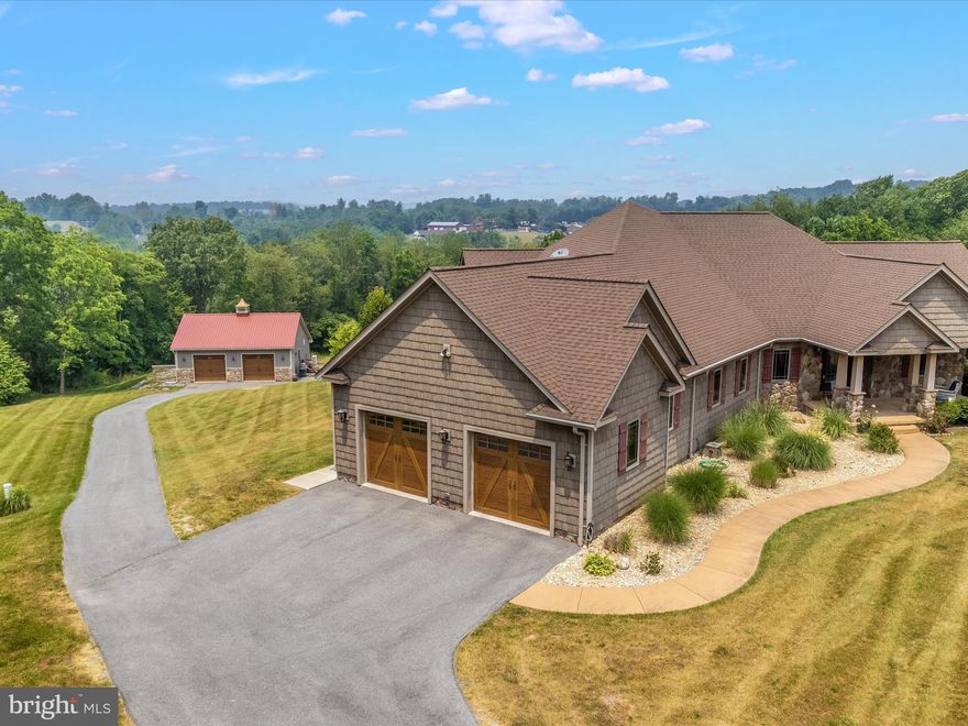 Honey, Stop the Car!! This amazing 100% Custom rancher shows like new and is only 9 years young. Immaculately maintained and features exquisite wood work and endless upgrades. This home was designed and built by Van Sant Custom Homes and has 4 bedrooms, each with their own full baths. Located on 4.3 private acres surrounded by woods. The outdoor area features an inground pool, jacuzzi tub and Tiki Bar. The Master Bedroom is a work of art with spacious walk in closet an attached office/sitting room. The Gourmet kitchen is a chef's dream. The open concept living, dining, kitchen area has lots of natural light and panoramic views as far as the eye can see. The basement has 2500 sq ft of finished area and features one bedroom, office, bar/kitchen, wine cellar, game room, living area and tons of storage space. The lower level walks straight out to the pool deck and Tiki Bar. This is a highly energy efficient home with Geothermal heating and cooling.  Additional features to note are:  Brazilian Cherry Floors, Travertine Floors, Commercial Grade, gas cooktop and handmade cabinets and trim throughout.  The Detached two car garage/workshop/mancave  is insulated, heated and cooled. 

Showings are by appointment only.