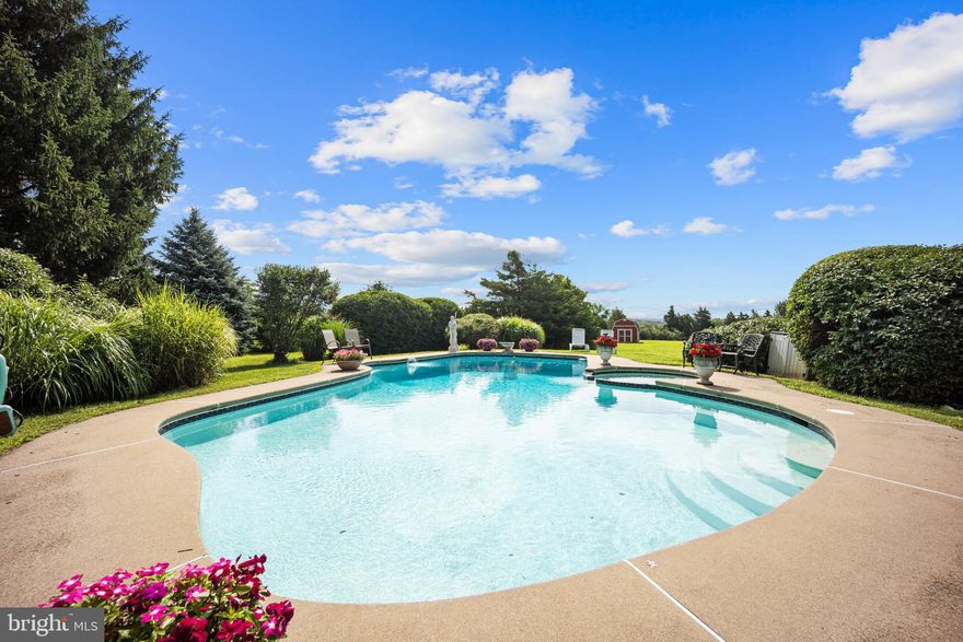 Experience modern luxury in this custom-built 5-bedroom, 3 full baths & 2 half baths masterpiece nestled on over 3 acres in scenic Pipersville. Spanning 5,345 sq ft, this show-stopping home features an open, light-filled floor plan, rich hardwood flooring throughout, and panoramic long-distance views from multiple decks. The resort-style backyard boasts an inground pool and expansive entertaining spaces, which include 4 decks —perfect for summer gatherings.

A rare 1,000 sq ft in-law suite with private elevator access, full kitchen, and separate living quarters offers the ideal setup for multigenerational living or guests. The oversized 3-car attached garage, brand-new barn-style shed, and generous lot provide endless space for storage, hobbies, and future expansion. Located in the desirable Palisades School District, this stunning retreat combines sleek design, privacy, and functionality—an exceptional opportunity for luxury living in Bucks County.