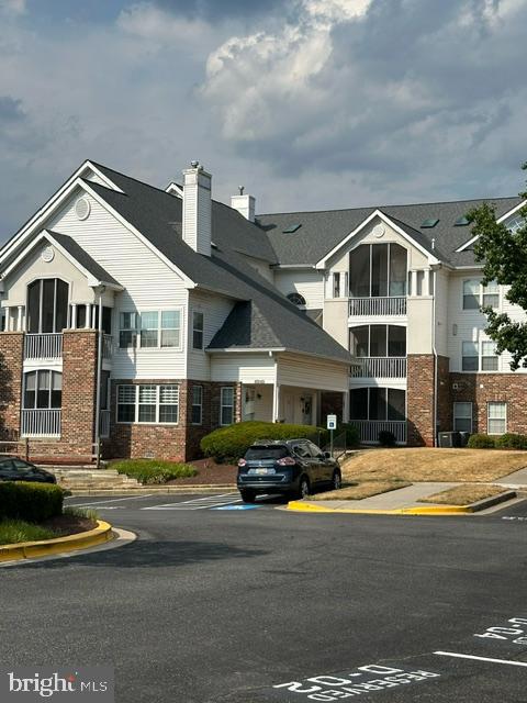 Welcome to this delightful top-floor condo with 2 bedrooms and 2 full bathrooms. As you step inside, you’ll be greeted by a spacious and sunlit living room featuring cathedral ceilings and a cozy fireplace. The dining room is equally inviting, and the galley kitchen boasts stainless steel appliances. Upstairs, a skylighted loft overlooks the living and dining areas. The primary bedroom offers ample natural light and an en-suite bathroom, while the secondary bedroom is also bathed in sunlight and provides access to the screen balcony. Speaking of the balcony, it’s a perfect spot for entertaining and relaxation. The community amenities include a pool, fitness center and clubhouse. Conveniently located in Greenbelt, this condo provides easy access to major highways, shopping centers, restaurants, and parks.