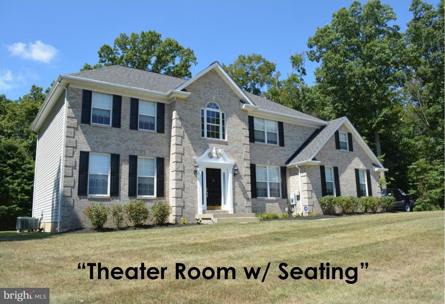 Beautiful & spacious best describes this custom colonial, front & back stairs, large kitchen & breakfast nook, hdwd flooring, library/5th bdrm, finished bsmt w/ bar area, family room, theater room w/ seating, projector & screening, large deck & patio, w/ sunseeker remote awning, backs to trees, side load garage, home shows very well.**Owner motivated relocating**