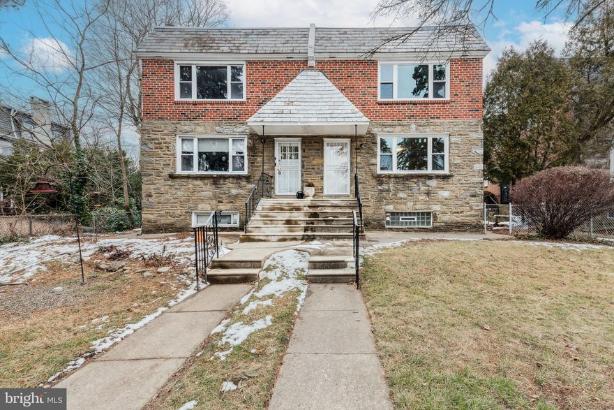 Welcome to 617 E. Durham Street in East Mt. Airy! This is a lovely, light-filled 4-bed/2.5-bath duplex that has just been carefully renovated (2024). Each unit has 2 beds/1 bath, beautiful original parquet floors that have been cleaned and refinished, a spacious living room, an eat-in-kitchen with adjoining dining room area, plenty of closet space, and an attached garage with space for 1 car (can be accessed from either the basement level or the rear of the house). [PLEASE NOTE: 617 E. Durham is the duplex on the right hand side of the first 3 photos. Photos of both 1st Floor and 2nd Floor Units are included in the listing -- they are not duplicates of the same photos.]

Each unit has a brand new kitchen with granite countertops, soft-close white Shaker cabinets, stainless steel Frigidaire appliances (refrigerator, dishwasher, built-in microwave, 5-burner gas oven/stove), disposal, under cabinet lighting, and luxury vinyl plank flooring. The brand new bathrooms have tile floors, American Standard shower tubs with subway tile surround (with built-in niche) and Carrara marble shelves, Carrara marble thresholds, brushed nickel fixtures, high hat lighting, vanities, and wall-mounted mirrors with medicine cabinets.

In addition to the updates mentioned above, many other upgrades have been made, including: fresh paint throughout, new brick pointing, a new fibered aluminum seal coat and resealed flashings on the roof, new doors, new locks, new double hung windows, new lighting throughout, 2 new hot water heaters, 1 new Crown Aruba boiler, new slate tile flooring (vestibule), most of the baseboard/trim throughout is new, and new concrete steps in the rear.

The house has a full basement with W/D hookups, a renovated half bath (new toilet, flooring, and lighting), an unfinished section with all of the mechanicals, and a large finished common room with new carpeting that leads to both of the separate attached garages.

There is a grassy front yard with tall, mature trees, as well as a backyard and driveway with access to both of the attached garages and to the easement that leads to Stenton Avenue!

This is the perfect home for an investor client or for someone who wants to live in one unit and rent out the other! What are you waiting for? Come and see this lovingly renovated duplex before it flies off the market!