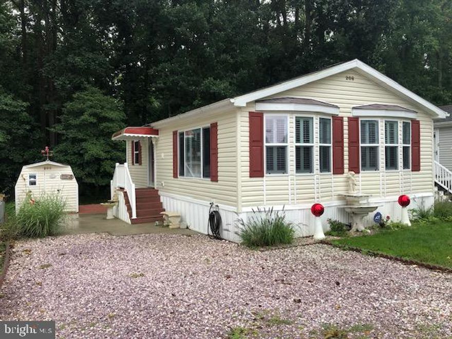 BRING THE BOAT!  THIS IS THE BEST BEACH HOUSE BUY AND VALUE IN THE RESORT AREA BY FAR ! REDUCED!! Unbelievable opportunity to own this 2-bedroom beach cottage in the water-oriented amenity packed community of White Horse Park just about 10 minutes to the Ocean City Beaches This cottage backs up to the trees with no one behind which is a preferred location in the community. This is not a ground rent property! YOUR BEST OPPORTUNITY TO OWN A GREAT BEACH COTTAGE AND THIS PRICE!! This is a fee simple deeded lot with a very nice 2-bedroom cottage that is furnished, tastefully decorated, modern, and comfortable with room for the whole family!! Almost brand-new refrigerator with ice maker, dish washer and disposal. Also features newer plantation shutters! central air and heat! Nice back deck, driveway/patio and a shed with electric! Sold with most furnishings making it turn key!! Concerned with only one bath? Don't be. There is a bath house and showers less than a two-minute walk away!! Pool is also very close!  This is a must see and you need to act fast or this one will be gone. The current owners have taken excellent care of this home. White Horse Park is just adjacent to Ocean Pines and is a waterfront gated community with 24-hour gated security with a pool, a private marina, boat ramp, boat storage, boat slips, jet ski slips, kayak and canoe racks, basketball court, playground, crabbing gazebo etc If you're a boater or just want to be one, this is the nicest and most affordable place in the whole area.  Many area attractions are just minutes away! Casino, golf courses, beaches, Assateaque  Island National Seashore, shopping, restaurants and night life. You will not find a beach home anywhere in the beach area, with a deeded lot with all these amenities at this price. Like I said need to hurry. Call today and make your showing appointment.  , Call listing agent for details and to set up a private showing.