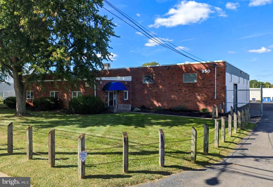 950 River Rd in Croydon, PA is a versatile, one-story industrial facility offering 11,206 SF of space on a 0.953-acre lot. The building includes 2,400 SF of office space, with assembly and warehouse areas, making it ideal for light manufacturing, warehouse distribution, parts/service, or showroom/sales. It features two tailgates, one drive-in door, a 14'6" ceiling height, and 25' x 40' column spacing. The property is equipped with rooftop HVAC for the office, ceiling-suspended heating units for the warehouse, and energy-efficient LED lighting. There are 30 employee parking spaces available. It is zoned M-1 Light Manufacturing District and has access to municipal water and sewer, as well as natural gas service.