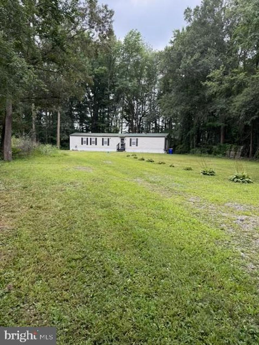 This fully leased Investment property features two-bedroom 2-bathroom singlewide home on almost an acre lot. This property is nestled in suburban surroundings. It’s perfect for anyone seeking tranquility and or a turnkey investment opportunity. Some updates include fresh paint & new floors throughout the home, vinyl replacement windows, and new screens and water treatment & filter. In the master bedroom, there is new vanity, sink, new plumbing supply lines and a new refrigerator. Trees were cut down and removed. 
Please call Realtor for appointments to show property. 24 hours’ notice is required.