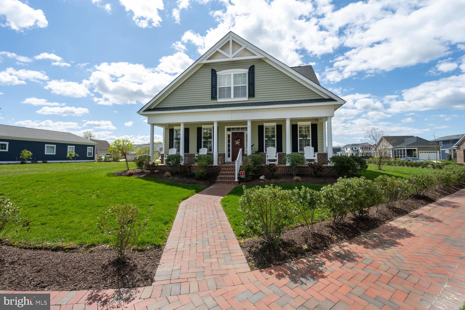 Experience nearly 3,000 square feet of refined living in this beautifully appointed four-bedroom home, perfectly positioned on a spacious end lot within a highly desirable waterfront community. From the moment you step onto the tranquil front porch, you’ll appreciate the thoughtful design and upscale finishes that define this exceptional residence. Inside, rich hardwood flooring flows seamlessly throughout the open floor plan. At the heart of the home lies a gourmet kitchen featuring sleek quartz countertops, a large center island, premium KitchenAid stainless steel appliances, a custom hood, walk-in pantry, abundant cabinetry, and a quartz breakfast bar—ideal for both casual dining and entertaining. The living room invites you in with the cozy ambiance of a gas fireplace, framed by elegant crown molding. Just beyond, the living space transitions effortlessly to a peaceful back patio—perfect for outdoor meals or relaxing evenings under the stars .The home offers four spacious bedrooms, including a luxurious main-level suite designed for comfort and convenience. Additional features include a functional mudroom, attic storage, generous walk-in closets, and an oversized two-car garage. Enjoy access to an array of resort-style amenities, including a clubhouse and pool, scenic walking trails, a bocce court, kayak racks, a private beach, and boat slips are available on the picturesque Tred Avon River. This home blends everyday comfort with elevated living in one of the Eastern Shore’s most charming and well-appointed communities. Come see for yourself—you won’t want to leave.