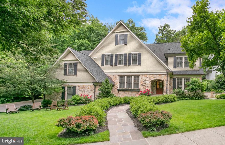 Located on a corner lot in the highly sought-after neighborhood of Forest Hills, 5025 Linnean Avenue, NW is a collection of curated spaces perfectly balanced for all occasions. This stone and cedar home was built in 2008 by acclaimed McCullough Residential Builders, offering 4 finished levels with high ceilings, multiple gathering spaces and generous outdoor space. 

The home is formally introduced by way of a sophisticated entryway, a stately dining room on one side and on the other a living room with coffered ceilings, a fireplace, and a private office beyond a pair of glass-paneled French doors. 

In the rear of the house is a chef’s kitchen with a full Viking appliance suite, bar seating, a breakfast table surrounded by windows, and a natural flow into the comfortable family room centered around a gas fireplace with access to the back patio. Easily accessible to the secondary main level entrance, where there are elegant built-ins for convenient storage and access to the attached 2-car garage. 

The expansive Primary suite is located on the second level, featuring a cozy sitting area with a fireplace, a private balcony in the bedroom, dual walk-in closets, and a large primary bath including a frameless glass shower, separate oversized tub, and dual vanity. Three secondary bedrooms with ensuite baths, and a laundry room complete the second level. The third level offers additional space for an office, study or recreation room with extensive built-in shelving with plenty of sunlight, and two additional bedrooms and a full bath. 

The recently renovated lower level is a grown-up play space with a 1000+ bottle wine cellar, full wet bar, tasting table, exercise room, and wide open lounge space. Completed by a seventh bedroom and full bath. The rear garden is lush and private, enhanced by a charming water feature and flagstone patio. The Forest Hills neighborhood is convenient to all of the restaurants and retail of Connecticut Avenue, as well as the hiking trails of Soapstone Valley Park.