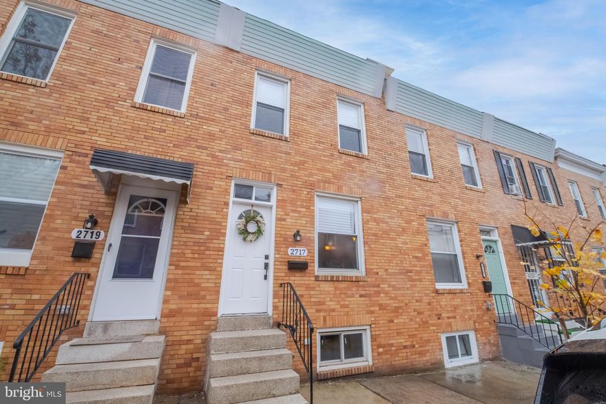 The FLHB Grant is Back! Take advantage of up to $12,500 towards closing costs and down payment help. Welcome to this outstanding four-bedroom home located at 2717 Mura Street with a Lower-Level In-Law Suite or make it a Rental Apartment for added income which is complete with a separate entrance.  This home features stunning hardwood floors on the main and upper levels, giving it an elegant and timeless appeal. The separate dining room provides a formal setting for entertaining guests, while the large living room offers plenty of space for relaxation and quality time with family. This deluxe kitchen is a chef's dream, with granite counters, an island, breakfast bar, prep sink, and ample cabinet space. It's the perfect place to create culinary masterpieces or gather with loved ones. On the upper level, you'll find three spacious bedrooms complete with ceiling fans. The luxury bath on this level features a tub/shower combination, providing a spa-like experience for your daily routines.  The lower level of this home offers flexibility and potential and is complete with counters/cabinets in place, a deluxe bathroom with a tub/shower, and high-quality LVP flooring, it presents an excellent opportunity for multigenerational living or rental income. Additionally, the fourth bedroom adds even more space and versatility to this already impressive property. Convenience is key, as this rowhouse also features a rear entrance into the unit, ensuring easy access for residents and visitors alike. There is a rear covered deck and a lower-level patio, which is perfect for outdoor parties. With-in minutes to Johns Hopkins, University of Maryland, MICA, Little Italy, Harbor East, Downtown, Shopping and Commuter Routes of 95, 895, 695. Don't miss the chance to make this stunning rowhouse your new home. Schedule a showing today and experience the ultimate blend of style, functionality, and comfort. Welcome Home!