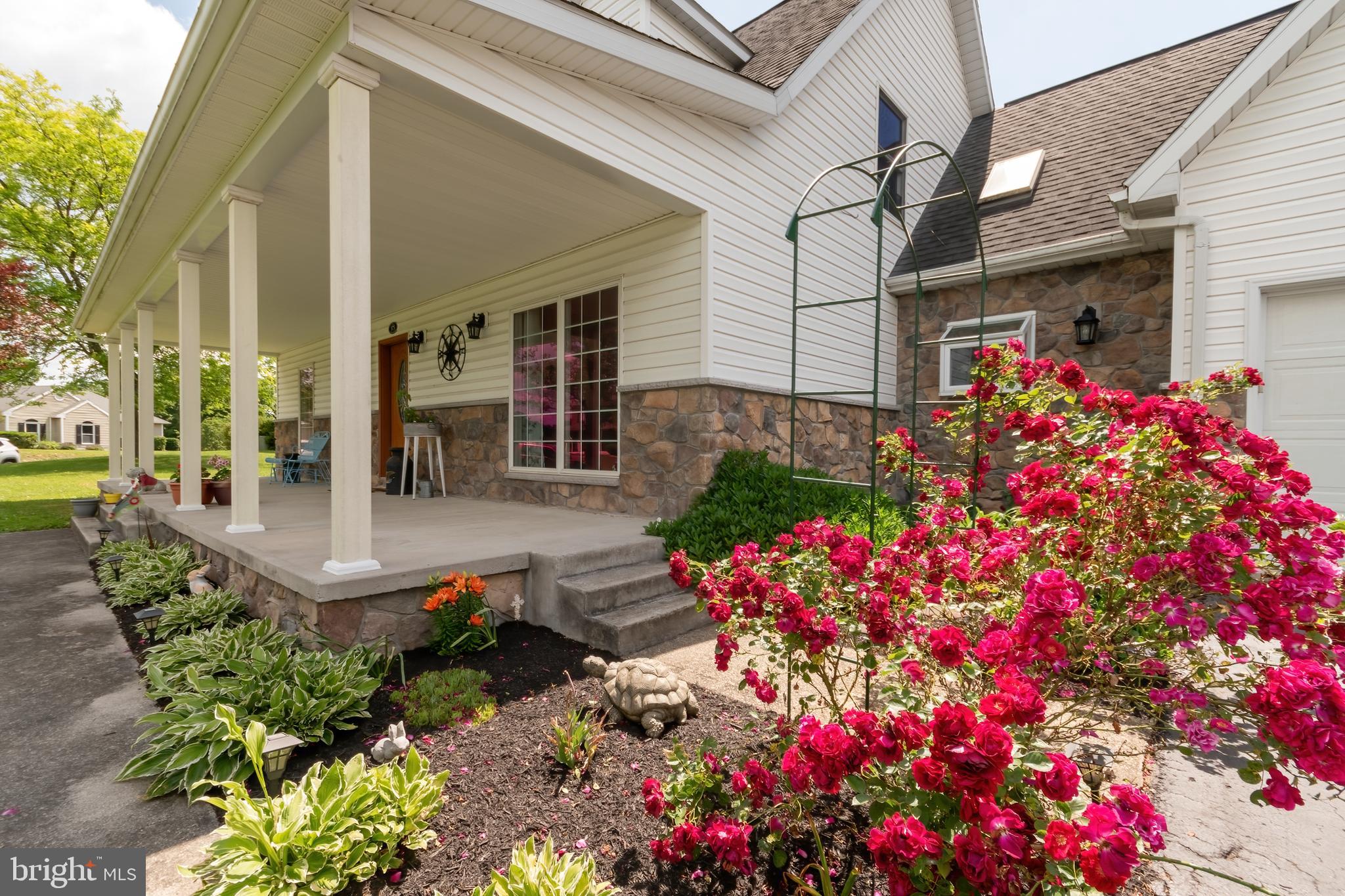 HERE'S YOUR CHANCE to watch the amazing mountain views from the large covered front porch of this beautiful cape cod home. Located just minutes to Rt 9, Rt 522 & all that downtown Berkeley Springs has to offer. This well maintained 2355 sq ft home features 3 bedrooms & 2 1/2 bathrooms on 2.35 +/- acres. The main level kitchen features an eat in area, breakfast bar, quartz counter tops, backsplash, garden window, island with a 5 burner gas cooktop, a direct vent hood, double oven & wine fridge. Additional main level features include a formal dining room, family room with cathedral ceiling, primary bedroom with a fireplace consisting of a stone floor to ceiling surround, primary bathroom with double sinks, half bathroom & a laundry room. Upstairs you will find two additional bedrooms with new carpet along with a large bonus room, full bathroom & access to the upper deck overlooking the lower deck & backyard. Property also features a full unfinished basement, utility room, whole house vacuum system, attic fan, large shed with loft, 20x30 outdoor garden area, 2 car attached garage, an OVER-SIZED DETACHED 3 car garage with heat & a separate storage room. Back on the market at no fault of the sellers. MOTIVATED SELLERS!!
