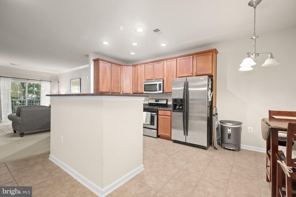 Photo of 9712 Handerson Place #UNIT 203, MANASSAS PARK, VA 20111 (MLS # VAMP2003926)