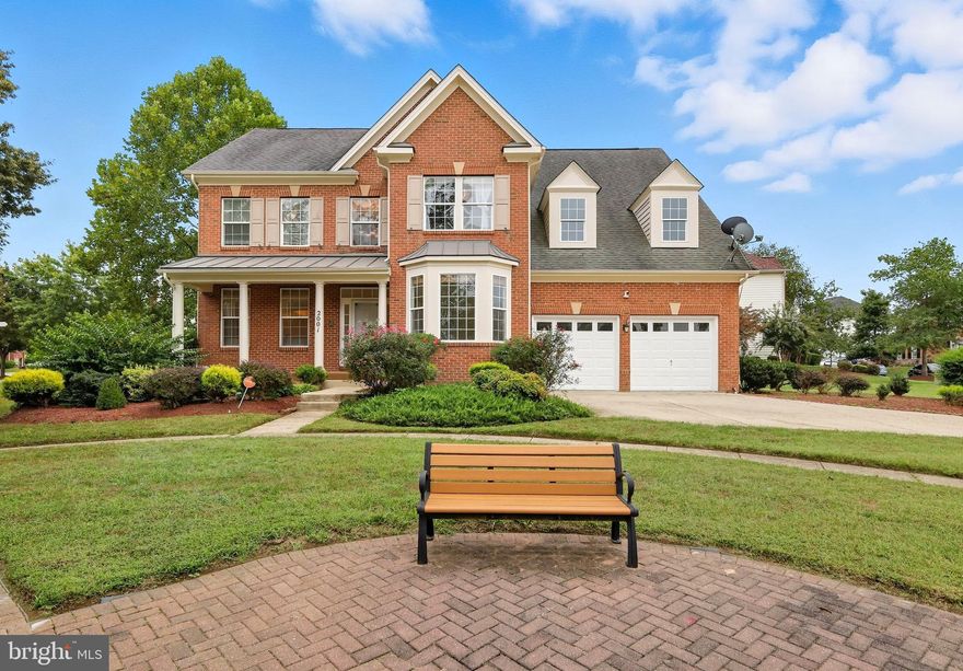 Sophisticated design, expansive spaces, and modern upgrades throughout. This luxurious estate spans 4,800 square feet of refined living space, offering 6 bedrooms (including 2 in the fully finished basement) and seamlessly combining architectural details with contemporary upgrades. A soaring 2-story foyer with custom millwork and freshly re-done stairs sets a dramatic tone, immediately showcasing the home’s upscale character and craftsmanship.

The main level has been designed for both everyday living and grand entertaining, showcasing a chef’s kitchen with waterfall quartz counters, chic pendant lighting, stainless steel appliances, new floors in the kitchen and breakfast nook, and elegant cabinetry. Vaulted ceilings with skylights illuminate the breakfast room, while the adjoining family room boasts coffered ceilings and a cozy gas fireplace. Formal living and dining rooms, a private office, and a stylish powder room further elevate the main floor.

Upstairs, the primary suite features tray ceilings, dual walk-in closets, and a spa-like bath with double vanities, a soaking tub, and a separate shower. Secondary bedrooms include an en-suite and a convenient hall bath, providing space and privacy for family or guests.

The fully finished lower level feels like its own luxury apartment, equipped with a modern second kitchen with quartz countertops and premium appliances, multiple flexible rooms, a sleek bathroom, and a spacious lounge anchored by a custom electric fireplace. Two of the home’s six bedrooms are also located on this level, providing versatile options for multi-generational living or extended guest accommodations.

Thoughtful updates enhance the home throughout, including freshly painted walls and flooring, a full home alarm system with cameras, water leak sensors, security lights, and door sensors, and a solar system that provides a remarkably low electric bill. A lawn sprinkler system ensures easy outdoor maintenance, while comfort and efficiency are further elevated by a dual-zone HVAC with a 2023 upgrade, a new water heater, and freshly remodeled kitchens on both the main and lower levels (2022 & 2023).

Outdoors, the home sits in a serene neighborhood setting, offering peaceful living just minutes from Washington, D.C. and National Harbor.

Your opportunity to live grandly with modern refinement is here—don’t miss it!