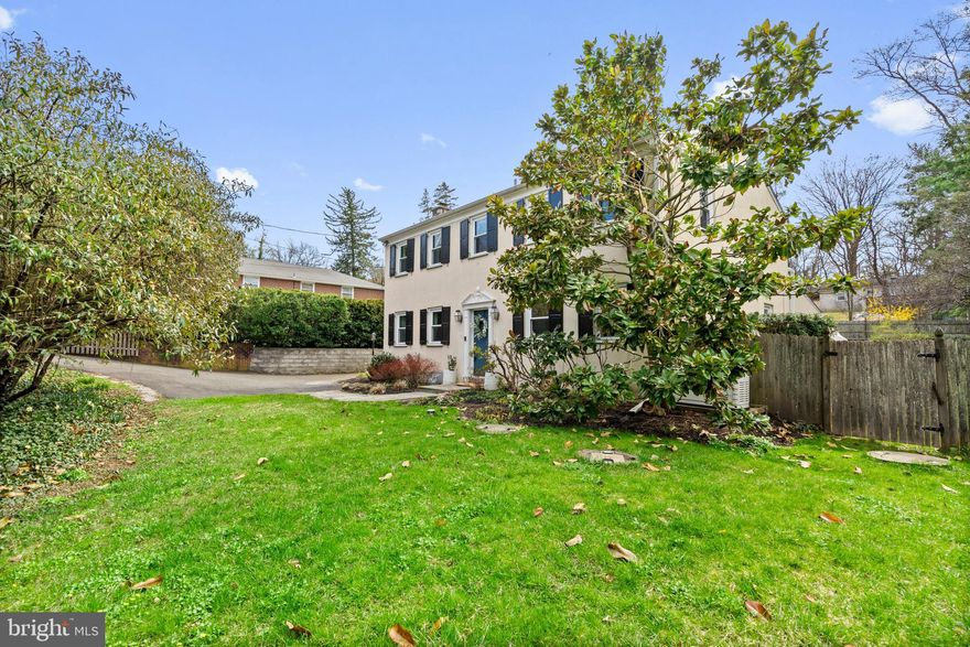 This sun-drenched colonial in the heart of Chestnut Hill is the perfect blend of charm, functionality, and timeless appeal. Nestled far off the road on a lush third of an acre, this property offers your very own private oasis with beautifully and professionally landscaped gardens, a covered back patio, and a stunning heated in-ground plaster pool—ideal for soaking up summer days in one of Philadelphia’s most coveted neighborhoods.

Step inside to discover a thoughtfully designed first floor featuring a welcoming foyer, a cozy living room complete with a grand wood-burning fireplace, a formal dining room, a bright and airy family room, updated powder room and large coat closet with custom shelving. The eat-in kitchen with breakfast room or additional living space, is a true showstopper, boasting white cabinetry, sleek quartz countertops, stainless steel appliances, and a gleaming marble backsplash—all with serene views of the patio and pool. Hardwood floors flow throughout, adding warmth and character to every room.

Upstairs, the expansive primary suite awaits, complete with a beautifully renovated ensuite bathroom and a walk-in closet featuring custom shelving for all your organizational needs. Three additional sun-filled bedrooms, each with generous closet space, offer comfort and versatility. A second full bathroom with a tub ensures plenty of room for everyone to unwind and recharge.

The high-ceilinged basement offers endless possibilities, whether you’re envisioning a home gym, playroom, or extra storage.

Location is everything, and this home delivers. Enjoy the tranquility of a private setting while being just a short walk to the top of the hill, where Chestnut Hill’s vibrant community awaits. From boutique shops and restaurants to convenient access to public transit (SEPTA and Amtrak) and the natural beauty of the Wissahickon trails, everything you need is within reach.

With new HVAC, windows, a pool pump, whole house generator and more, this classic home is perfectly suited for modern living. Don’t miss your chance to call 8720 Stenton Avenue home—where you’ll be lounging by the pool and making memories for years to come!