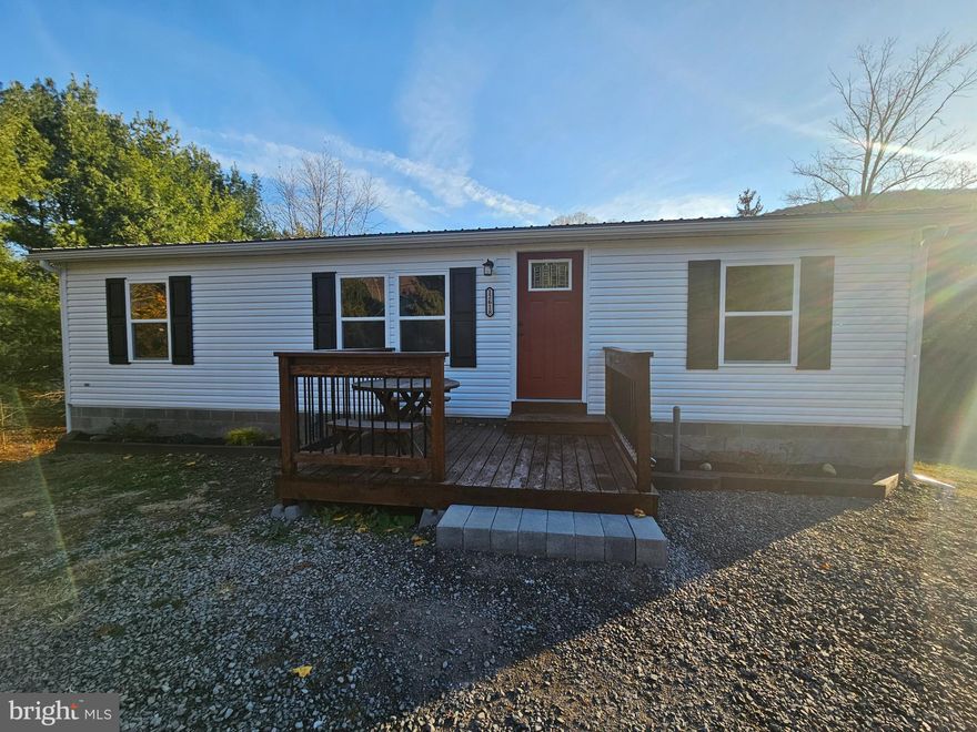 Nestled in the charming Bowling Green community, this exquisite double-wide home offers a perfect blend of comfort and luxury. Built in 1996, this ranch-style residence has been completely remodeled in 2025. With upgrades including new CA, new furnace, brand new baths and kitchen with quartz countertops, all new entry and interior doors, new insulation and drywall on main level, new lighting, 2 brand new decks, new appliances, new flooring and paint, new trim, new metal roof and more.  Step inside to discover a warm and inviting interior, where natural light dances across the upgraded countertops and plush carpeting. The heart of the home features a well-appointed kitchen equipped with a gas oven/range and a sleek dishwasher, making meal preparation a delight. The open-concept design seamlessly connects the living spaces, creating an ideal environment for entertaining or simply enjoying quiet evenings at home. A primary suite that serves as a serene retreat with a walk in closet.  The primary bath is complete with a walk-in shower and a dual vanity perfect for unwinding after a long day. The home's layout includes a convenient main floor laundry area, ensuring that daily chores are a breeze. Venture outside to appreciate the expansive 0.55-acre lot, where you'll find an outbuilding that adds extra storage. Off-street parking ensures convenience for you and your guests. The full basement, accessible from both inside and outside, presents endless possibilities for customization, whether you envision a recreation room, additional bedrooms, or a personal gym. With a walkout level, this space seamlessly connects you to the outdoors, enhancing your living experience. This property is not just a home; it's a lifestyle. Enjoy the tranquility while being just a short drive from local amenities and recreational opportunities. Embrace the luxury of space, comfort, and modern living in this stunning manufactured home, where every detail has been thoughtfully curated for your enjoyment. Experience the perfect blend of elegance and practicality in a setting that truly feels like home.