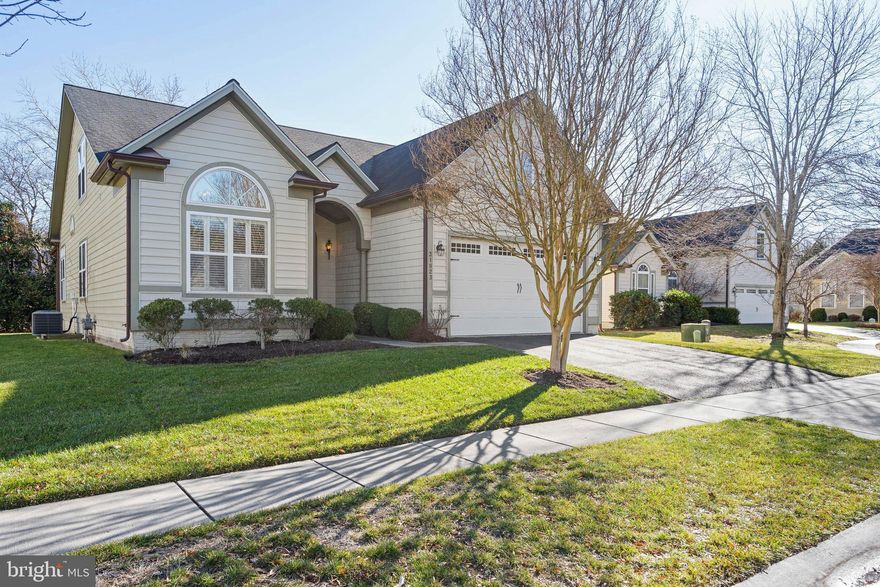 Nestled near a tranquil cul-de-sac, this 4-bedroom, 3-bath  NVR home offers upscale living with upgrades and a landscaped lot with mature holly trees for privacy. The open layout boasts wood floors and abundant natural light. The Great Room features a stunning stone gas fireplace, TV and Cable hook-ups above fireplace, ceiling fan, and seamless flow into the kitchen, complete with granite countertops, stainless steel appliances, breakfast bar, and pantry. Relax in the cozy sunroom off the Great Room, perfect for watching TV or enjoying your morning coffee or evening libation. For alfresco dining, the screened porch off the dining area provides a delightful alternative.
A split floorplan ensures guest privacy with their bedroom at the front of the house, while the spacious primary suite, located at the back, features a tray ceiling, walk-in closet and master bathroom with dual vanity and walk-in shower. The main floor also includes an office, ideal for working from home or managing paperwork. Upstairs, you’ll find the 3rd and 4th bedrooms, a 3rd bath, and a floored storage room.
Step outside to enjoy a screened porch overlooking lush landscaping and mature specimen holly bushes. This award-winning Bay Forest Club community offers resort-style amenities, including pools, a lazy river, tennis courts, a fitness center, a kayak launch, and walking trails. Just 5 miles from Bethany Beach and with HOA-maintained lawns, this home combines luxury, convenience, and coastal charm. Make it yours today!