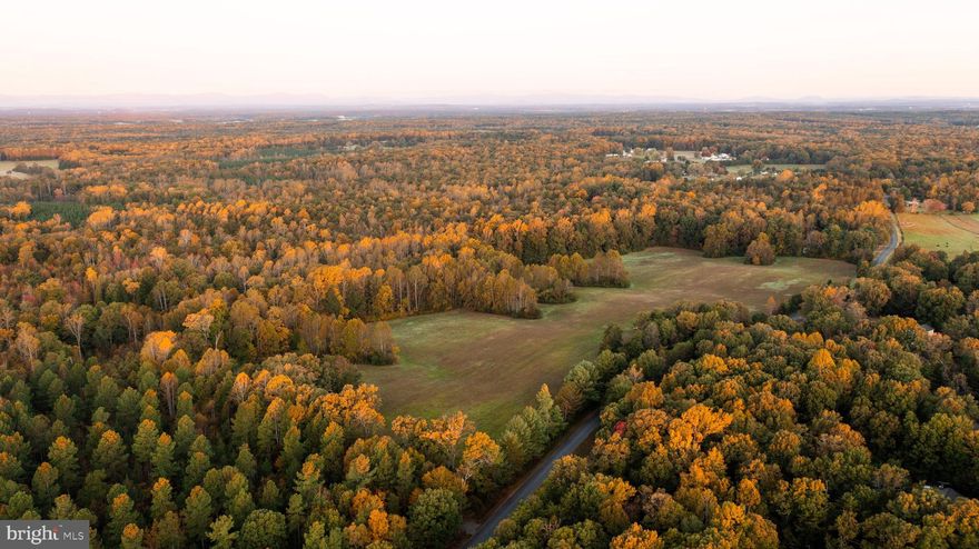 Discover a rare opportunity to own a stunning piece of land with swift access to Sumerduck Road, providing convenient routes to US-17 and US-15. This prime location places you within a short 35-minute drive to Bealton, Warrenton, Culpeper, and Fredericksburg, making it perfect for those seeking a blend of tranquility and accessibility. With over .25 miles of extensive road frontage, this property ensures ease of entry while offering a sense of privacy amidst the natural surroundings.
Spanning approximately 46 acres, the property boasts about 20 acres of open field currently utilized for hay production, complemented by over 26 acres of towering hardwoods and softwoods. The topography is predominantly flat, with very little slope, making it ideal for various agricultural or recreational endeavors. This land is an excellent opportunity for equestrian enthusiasts, offering ample space for stables, riding arenas, and trails. Additionally, its potential for division and development presents a unique investment opportunity for those looking to create a private community or residential development.
Nature lovers will appreciate the rich biodiversity that this property supports, as it is home to a variety of wildlife, including deer and turkey. The land offers excellent hunting opportunities, making it a haven for outdoor enthusiasts seeking adventure and tranquility. A small seasonal spring runs through the property, meandering its way down to the Rappahannock River, adding to the scenic beauty and serene ambiance of this exceptional piece of land.
Don’t miss out on this unique chance to secure a versatile property that caters to both recreational and developmental aspirations. Whether you envision a peaceful homestead, a thriving equestrian facility, or a potential subdivision, this land offers endless possibilities to bring your dreams to life.