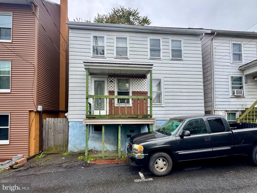 Detached single home currently laid out as a 3 bedroom 1 bath home - bring your imagination and re-design as you wish!  This home needs full rehab.  Large town yard.  Located in walking distance to all town amenities, such as the community recreation complex including the pool, little league fields, and playgrounds, as well as convenience stores and restaurants.  Located near Rt 901 and I-81, as well as High Ridge.  AS-IS with all contents included.