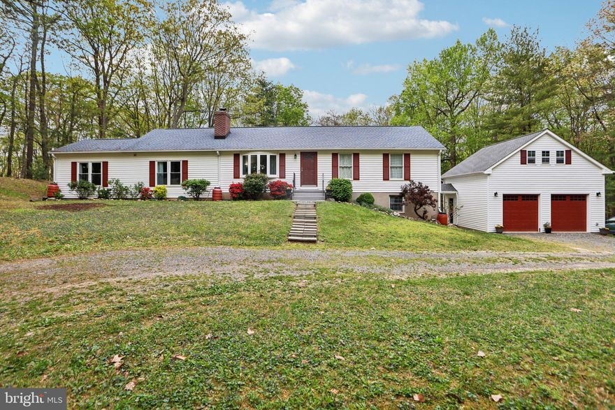 Sellers are requesting an offer deadline for 8 PM Tuesday, April 29,2025.  Please submit your highest and best by the deadline. All offers will be reviewed and a decision will be made on Wednesday, April 30,2025.  Please submit offer in one pdf. to listing agent.  Welcome to this stunning 4-bedroom, 2-bath rambler in Fauquier County’s desirable MountJoy Estates—offering over 3,300 square feet of beautifully updated living space on two levels, all set on 12 wooded acres with four natural springs and private trails.

The main level showcases timeless hardwood floors and a spacious living room with a bow bay window. A HUGE family room—perfect for gatherings—features a gas fireplace, hardwood flooring, and a ceiling fan, and opens into the formal dining room, which is bright and also equipped with a ceiling fan. The dining room walks out to the rear patio featuring a Portico. Off the family room, you’ll also find a cozy sitting area/library.

The remodeled gourmet kitchen is sure to impress with a sunny breakfast area, stainless steel appliances including a refrigerator with bottom freezer, range with canopy hood, dishwasher, microwave, and a deep stainless steel farm sink. Granite countertops and a custom backsplash add the finishing touches. French doors lead out to the deck—perfect for outdoor entertaining.

This home features three fireplaces (gas, wood stove, and insert), multiple ceiling fans, and plenty of recessed lighting, adding charm and comfort throughout. The main level also includes three generous bedrooms filled with natural light, including a primary suite with an en-suite bathroom and an additional updated hall bath.

Downstairs, the full basement offers additional living space with a large recreation/sitting room featuring a cozy wood-burning stove, the 4th bedroom, and a spacious laundry/storage room.

From the basement walkout, access the breezeway leading to an oversized 2-car garage with an unfinished loft—ideal for a future guest apartment, home office, or studio.

Notable updates include:
HVAC (2021)
Hot water heater (2022)
Windows & doors (2018)
Roof (2015)

A rare find that blends modern upgrades with tranquil, country living—just minutes from amenities and major routes. Don’t miss your opportunity to own a slice of Virginia paradise!