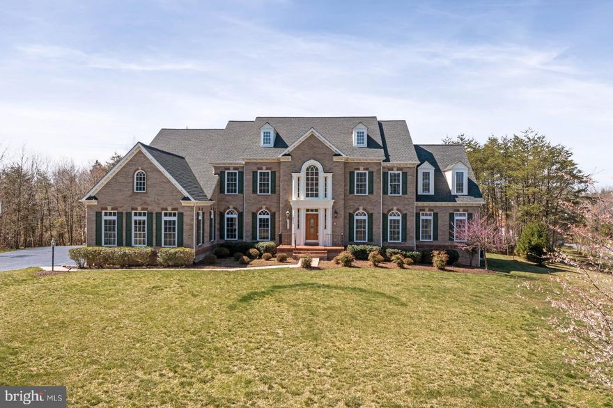 Stunning, 3-sided brick estate home on a fantastic 3+ acre lot in Cedar Crest surrounded by trees. 
Enough space for a second structure/Guest House and pool (* as approved by County and HOA)! 
Just 2 miles to the new Paul VI campus! 

This immaculate home was built with every possible addition and upgrade offering 8,250 sqft of meticulous living space on three levels. 
Enter through the dramatic two-story Foyer with sweeping staircases and chandelier
walking the soaring two-story Family Room with a wall of windows overlooking the backyard.

The main level offers Brazilian hardwood floors throughout the whole level, a cozy gas fireplace and built-in entertainment-system-cabinetry;  
Gourmet Kitchen with high end Viking/Bosch Appliances, Butler’s Pantry, Beverage Station, walk-in-pantry and attached sun drenched Morning Room with cathedral ceilings; 
Beautiful 2nd sunroom addition with imported large format Turkish tiles; Home Office with French doors

On the upper level you'll find the primary Suite boasting a Sitting Room, oversized walk-in-closets, En Suite designer bath with a soaking tub and dual vanities; The other 4 Bedrooms are all connected by the open hallways and all directly connected to baths (1 Jack and Jill); 

The Lower level hosts a huge wet bar with dishwasher and refrigerator that sides with a large storage area that can be converted to a future wine cellar; large Rec Room/Game Room, full bath, and gas fireplace.
Additionally, so much potential in the unfinished space. Add a 6th bedroom, media room and gym in the extension (all roughed in) or use the massive space for storage.

The phenomenal back yard is the perfect spaces to entertain your guests on the weekends, sip your morning coffee, or find peaceful retreat after a long day; 
You will find a recently added Patio, Outdoor lights, sprinkler system and the whole house surround sound reaching into the backyard (house also has intercom system); 
Finish the space with a deck for direct access to the sunroom/bar and kitchen
New roof in 2016, three zone HVAC systems (recently updated). 
This outstanding property is ready to welcome YOU home!