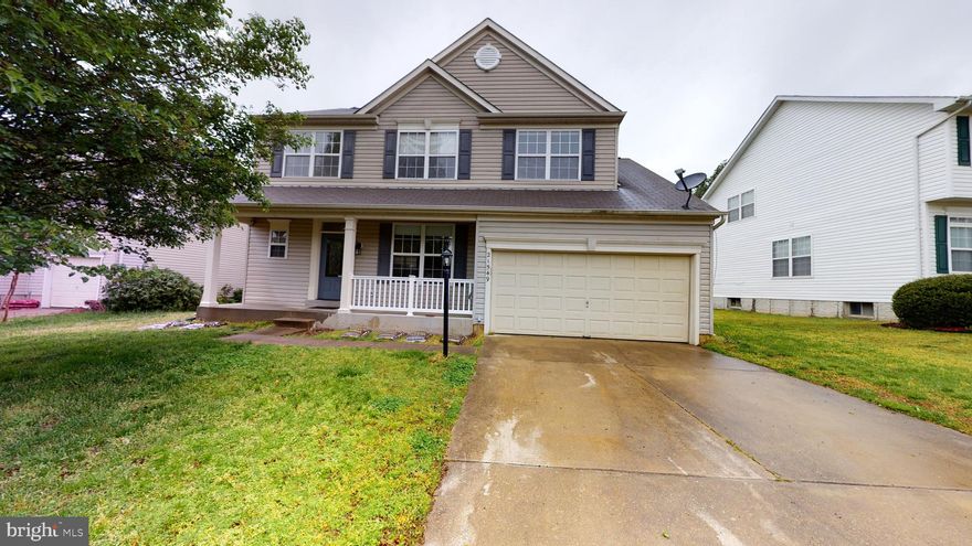 Minutes to PAX NAS. This 4 bedroom 2 1/2 bath Colonial features new flooring and paint throughout. Formal living room and dining room, eat-in kitchen opens to the family room with gas fireplace and built-in shelves. Master bedroom features 2 closets and attached bath with soaking tub, separate shower and dual vanity.  Finished basement with plenty of storage. Additional features include attached 2 car garage, laundry room and rear deck.