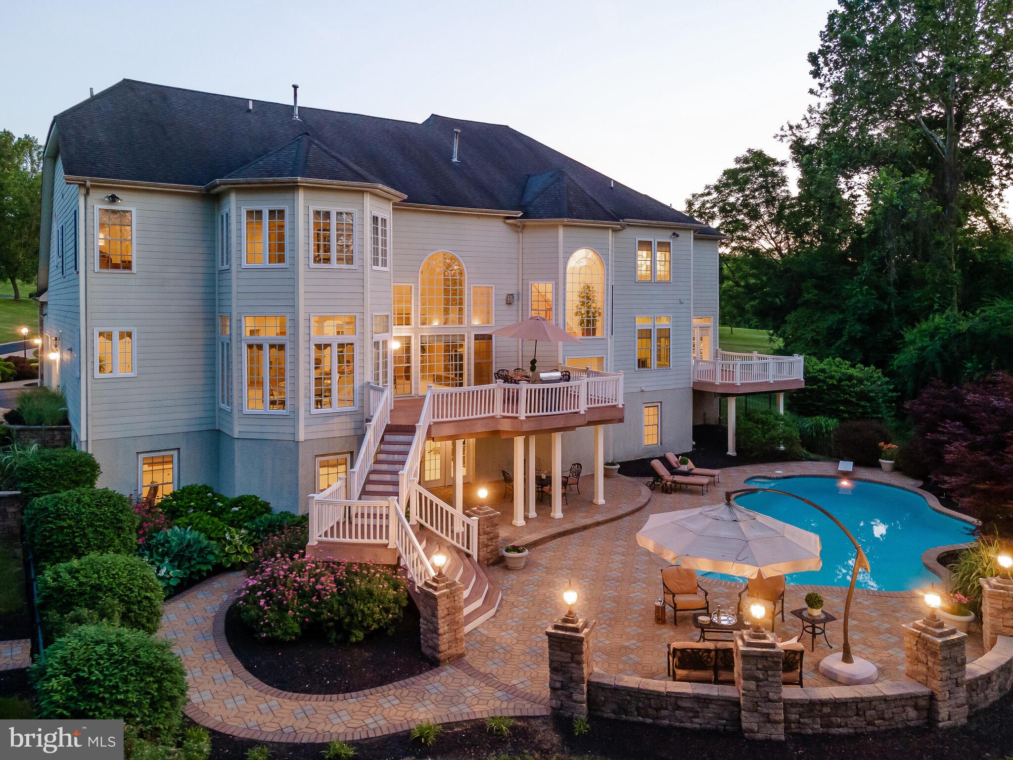 Welcome to 19 Schofield Road in bucolic Schuylkill Township. This stunning brick colonial home is located on a premium 4.3 acre lot in Anderson Farm that enjoys private wooded views. It offers three levels/floors of living space, 6 bedrooms, 5.1 bathrooms, a large finished basement, two separate composite decks and a resort like pool and backyard area. The location of this home offers the benefit of being part of a small enclave of homes on a cul-de-sac that all enjoy such privacy on very spacious lots.  Enjoy the beautiful year round views, from the back deck off the conservatory or the deck off of the kitchen. The grand entrance hall features gleaming hardwood floors, stately columns, and twin staircases. It is flanked on either side by the spacious living room to te left and the Dining room to the right. Off of the Living room you will find the light filled conservatory with three walls of windows that would function beautifully as a sunroom or music room with the added feature of a private deck. The private office/study is located adjacent to the conservatory and also enjoys views of the private backyard. The large kitchen features upgraded granite countertops, center island, raised panel maple cabinetry, full walk-in pantry, stainless steel appliances, and a doorway leading to the large deck that is perfect for barbecuing and relaxing with friends and family. The two story family room continues the open floor plan and features a gas fireplace with floor to ceiling stone, coffered ceiling, and a wall of windows. The laundry room with side entrance, mud room, and a second staircase to the second level and a powder room complete the main floor of this home. The gracious second floor landing with its large windows overlooks the backyard. The lavish master suite is entered through double doors and offers a separate sitting area that can be used as a secondary office area or just a quiet space to curl up with coffee and a good book.  The sumptuous Master bath with a large soaking tub, two separate vanities, large glass enclosed shower, oversized walk-in closet and a large walk in linen closet has a comfortable amount of space. Bedrooms 2 & 3 are spacious with walk in closets and their own en-suite bathrooms. The 4th bedroom is large with a large walk in closet. The 4th and 5th bedrooms share a jack and jill bathroom and complete the second floor. The huge daylight walkout lower level is finished with a kitchenette, family room, and flex room that can be used as a media room, etc.. Completing this level is the sixth bedroom along with a full bath and large walk-in closet and LOTS of storage. This stately home has it all; plenty of light, neutral decor, tremendous storage space, a 3 car garage, and is move in ready. Custom moldings, gleaming hardwood floors, Palladium windows, a rear staircase, endless closet space & spectacular private views both inside & out make this a truly once in a lifetime opportunity. Located in a private and serene neighborhood on a cultural-de-sac, this property is minutes from Valley Forge National park, close to the Paoli train station, 7 miles from King of Prussia, easy access to Rte. 422, 202, 76 the PA Turnpike, country clubs, restaurants, & the Main Line.