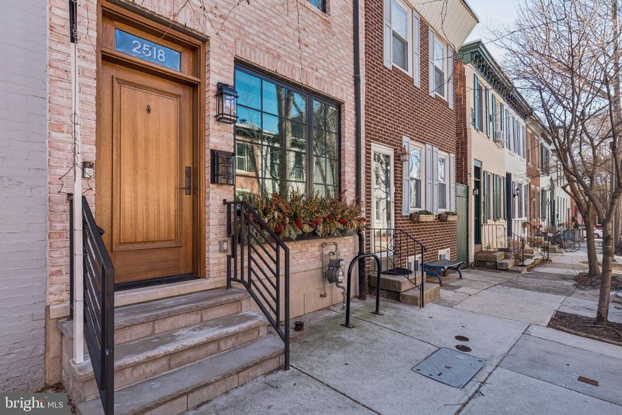 10 year tax abatement till 2033 (taxes are $3,919.44 for 2026)! Divine Fitler Square location on a sought after low-traffic, tree-lined block with easy parking. Two blocks to Fitler Square Park and two blocks to Schuylkill River Park. Ultimate in convenience to the South Street Bridge to Penn, CHOP, HUP, 30th Street Station and 76/highways. Greenfield school catchment. 2518 Waverly is a rare find - spacious newer construction home with 3/4 bedrooms, 2.5 baths, yard off the kitchen, gorgeous roof deck with Center City skyline views and a fully finished lower level with high ceilings. High-end finishes throughout. Sellers purchased as breathtaking new construction and added some of their own touches: front window planter, more kitchen cabinets for tons of storage, new backsplash, carpet runners and handy bike rack. Freshly painted for easy move-in. Admire the painted brick exterior with stone accents, black Pella windows and solid mahogany front door. Enter into the living room/dining room with noticeably high ceilings. Wide plank hardwood flooring. Gourmet kitchen features Thermador built-in appliances, quartz counters and a large waterfall island with seating for 4. Custom Pella sliding glass doors to the fenced outdoor yard perfect for pets, grilling, gardening or relaxing. Up the straight stairs, 2 spacious bedrooms, a hall bath with tub/shower + shelf of reclaimed wood from the original home. The entire top floor is the primary suite - large bedroom, walk-in closet and en suite bathroom featuring elegant basketweave marble heated floors. The crown jewel is the roof deck with unobstructed city skyline views! Bonus: fully finished lower level includes a 4th bedroom with a door (privacy) that could also be used as a den/fitness studio/office + half bath. Generous ceiling height. Take advantage of this chance to live in the "urban village" of Fitler Square, enjoying local favorites like Rival Brothers, Mr Rabbit Coffee, Cafe Lutecia, Bacchus, Rowhome Coffee and easy shopping at Heirloom Market, South Square Market + Amazon pickup, CVS & Wawa nearby. Schedule your showing today or stop by an open house!