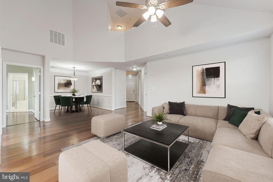 This rarely available luxury penthouse in the heart of sought-after King Farm is a true gem! Step into the inviting foyer, where gleaming hardwood floors lead you into a sun-drenched, expansive living room. Featuring a dramatic vaulted ceiling, a lighted ceiling fan, and an adjoining dining room with rich hardwood floors, this space is perfect for relaxing or entertaining.

The generously sized primary suite is a private retreat, complete with a luxurious ensuite bathroom and a walk-in closet outfitted with custom organizers. The second bedroom suite offers plenty of privacy, a custom closet, and its own ensuite full bathroom. For culinary enthusiasts, the chef’s kitchen is a dream, boasting 42” custom cherry cabinetry, granite countertops, recessed and pendant lighting, and a ceramic tile floor. The kitchen opens to a bright breakfast room, surrounded by windows that flood the space with natural light.

Upstairs, a secluded third bedroom retreat awaits, complete with its own ensuite bathroom, perfect for guests or a private office. Additional features include a convenient main-level laundry room and private garage parking with extra storage space.

This vibrant community offers incredible amenities, including a  pool, tennis courts, tot-lots, walking paths, and even a free Metro bus shuttle. With easy access to shopping, dining, and more, this penthouse is the perfect blend of luxury, comfort, and convenience. Don’t miss the chance to call it home!