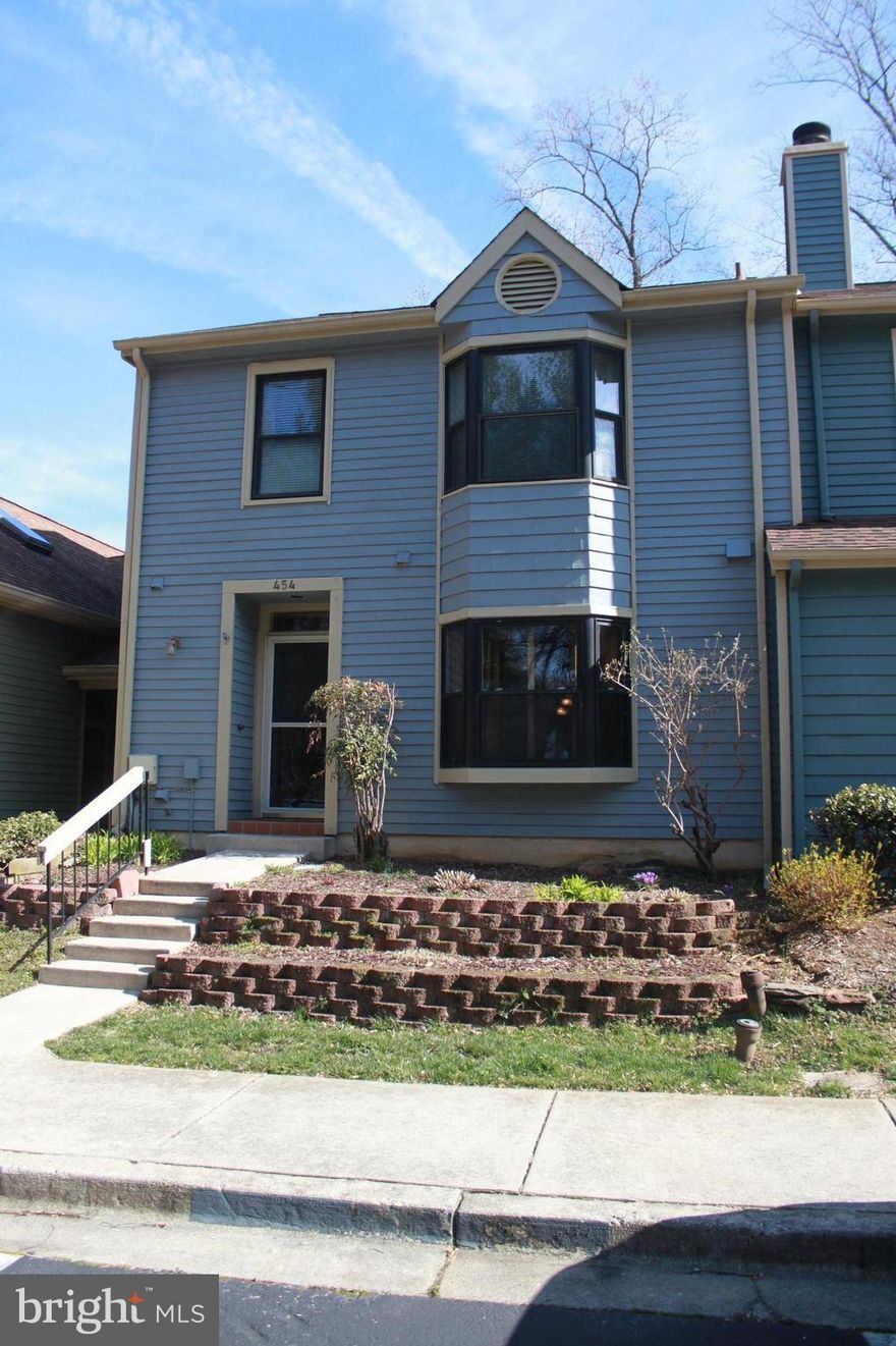 Price Reduction!!!  Remarkably maintained 3 BR, 3.5 Bath, townhome in sought after Woods Landing; boasts a two level deck w/ walkout basement access; Completely finished LL w/ full bath & Murphy Bed could be used as 4th BR; Spacious kitchen w/ breakfast nook; Large open concept dining room overlooks living room; two fireplaces; MBR w/ private balcony; dedicated carport; home warranty.