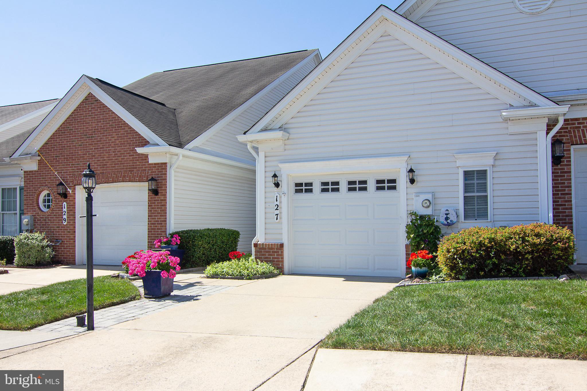 Welcome home to this lovely Crestwood model offering beautiful moldings and an open floorplan. The primary ensuite features dual sinks, an easy step-in shower and a large walk-in closet. An eat-in kitchen overlooks the cozy courtyard and shares easy access to the garage and laundry room. The library with French door access offers a bright quiet place to relax, read, or use for an overnight guest. The Living room/dining room combo with 12 ceilings, makes entertaining easy while the bright sunroom & maintenance-free deck add a relaxing getaway. Don't miss out on this unique opportunity to enjoy a vibrant, active lifestyle in a prime location within the Carroll Vista community.