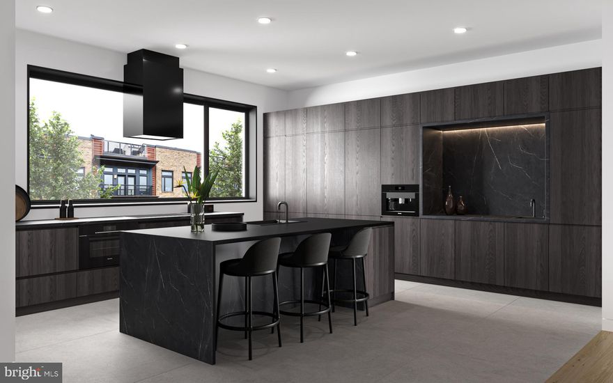You’re Almost Home: The Kenilworth III new construction homes offer ultimate townhome living.     

  Spread across 4,300 SF of living space, you’ll find top-level finishes, carefully thought open floor plans, a five-stop elevator, 9’+ floor-to-ceiling windows, custom metalwork, recessed millwork, and Savant smart home integration. Enter the home through a custom 4’ wide pivot hinge entry door and you will first find a convenient home office with an en-suite powder room, and a built-in coat closet in the main hallway.     
   
Upstairs, the living space is anchored by a gas fireplace with custom blackened steel surround and wide-plank hardwood flooring.  Next, you will find a well-curated kitchen finished with Miele appliances, 48” panel-ready fridge, a built-in coffee maker, sleek wood-grain cabinetry, a tiled floor with large format tiles, sophisticated black honed counters, and an additional wet bar area with additional built in fridge.     
   
On the 3rd floor you will find 2 bedrooms with custom closets, an additional living/lounge area, walk-in laundry room, and a spa-inspired hall bathroom with porcelanosa tile, Watermark fixtures, and a heated tile floor.    
 
The 4th Floor primary suite encompasses the top level featuring 10’+ ceilings, unobstructed city skyline views from the 10’ tall windows with green roofs right outside, a primary spa equipped with a built-in steam shower system, matte black soaker tub. and large dual sink vanity and a private water closet.  In addition, the primary has an impressive walk-in closet with over 26’ of built-in cabinetry.  Lastly finishing off the fourth floor includes another wet bar area and a separate powder room set up perfectly for roof deck entertainment.     

The basement is another great place to entertain guests with a superb layout for a home theatre and includes a 3rd conveniently located wet bar, a fourth bedroom, and another spa-inspired bathroom. Additional features of this home include a two-car garage with electric car charging, a 4-zone HVAC system,  designer steel staircase from top to bottom with custom-fit 4” oak treads.      

From heated front and rear sidewalks to a green roof view outside the primary suite, this home is built of the highest quality materials for ultimate luxury living. Take advantage of stunning rooftop views, quiet cul de sac streets, and full  10-year tax abatement. Graduate Hospital is an extremely walkable neighborhood home to an abundance of restaurants, shops, and just steps from Center City.

Delivery May/June 2025