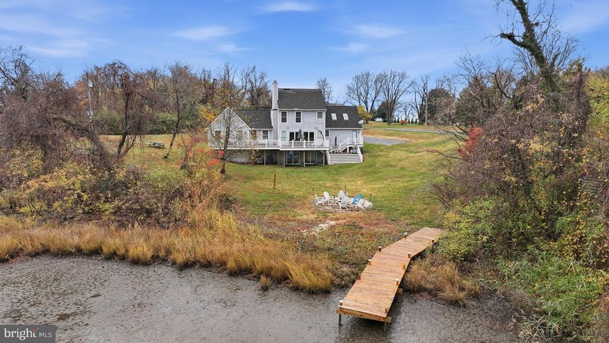 Enjoy your custom waterfront paradise, nestled in the heart of scenic Love Point on Kent Island and overlooking the Chester River inlet. This five-bedroom, three-and-a-half-bath home features two main-floor master suites on opposite sides of the house—perfect for multigenerational living or providing extra space for visiting friends and family.

Inside, you’ll find recently refinished hardwood floors, crown molding, floor-to-ceiling glass doors, a soaking tub with a separate shower, exposed beams, built-in shelving, walk-in closets, and of course, a cozy fireplace.

Set on more than an acre, the property offers a quiet, sheltered cove and a large stone firepit—ideal for peaceful evenings under the stars. The intimate waterfront setting includes a private dock, perfect for boating, paddleboarding, and kayaking. And let’s not forget fishing and crabbing right off your own pier (have you seen crab prices lately?).

 The walkout basement opens to the waterfront side of the home. The finished lower level has a large recreational room with built-ins shelving, and additional rooms for guests, hobbies, gatherings, and storage.

Located just minutes from Kent Narrows and the Bay Bridge, it is just a short drive to Annapolis, commuting distance to NSA, Washington, DC, and Baltimore (your commute will be worth it as you will feel like you're on vacation as soon as you get home).  Adding to your joy and happiness is the property's easy access to waterfront dining, nature and bike trails, birdwatching areas, and local vineyards. With ample parking, including room for boat trailers, this home is well-suited for boaters, large families, or anyone who loves to entertain. This well-appointed waterfront home provides a peaceful setting with plenty of room to unwind and enjoy the beauty of Kent Island.