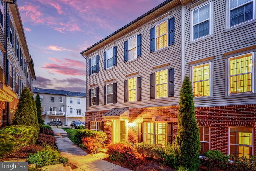 Multiple offers received. OFFER DEADLINE set for 5 pm on Monday, May 18th. Welcome to 15381 Rosemont Manor Drive — a beautifully maintained condo-style townhouse nestled in the highly desirable Market Center community of Haymarket. Offering nearly 1,900 square feet of living space across three finished levels, this move-in-ready home combines comfort, style, and modern convenience. The entry level welcomes you with a spacious foyer leading to a versatile first-floor bedroom filled with natural light and generous closet space — ideal for guests, a home office, gym, or additional living area. This level also features a full bathroom with updated hardware and access to the rear-loading one-car garage with added storage space. Upstairs, the main living level showcases an open-concept layout with rich hardwood floors, a bright and inviting family room, and a convenient powder room. The expansive center-island kitchen is designed for both everyday living and entertaining, featuring granite countertops, stainless steel appliances, a custom tile backsplash, and ample dining space. Step outside to the private balcony — perfect for enjoying morning coffee or relaxing at the end of the day. The upper level includes a spacious secondary en-suite bedroom with its own private bath, a laundry closet, and a luxurious owner’s suite complete with a large walk-in closet, and a spa-inspired bathroom featuring double vanities, and a spacious shower. Recent updates and smart-home enhancements add even more value, including fresh interior paint (2026), newer washer (2023), updated kitchen blinds (2023), a brand-new garage door opener (2025), updated lighting fixtures (2024), an Ecobee smart thermostat, Eufy video doorbell, and a smart ceiling fan in the primary suite. The monthly condo fee covers water, trash service, roof and exterior maintenance, snow removal, and access to exceptional community amenities including a clubhouse, swimming pool, playgrounds, and picnic areas — offering truly low-maintenance living. Perfectly situated directly across from UVA Medical Center and just minutes from I-66, Route 29, and Route 15, this home offers unbeatable commuter convenience with easy access to Downtown Haymarket, Gainesville, shopping, dining, and entertainment.