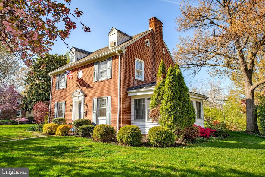 Charming, move-in ready colonial located on a quiet, tree-lined street in historic Dundalk. This property boasts a traditional layout with gleaming hardwood floors, 3 bedrooms, and 2 1/2 bathrooms. The attic has been partially converted into a loft to offer a bonus room that can be used as an office, playroom, or extra bedroom. First level features a half bath, living room, sunroom, dining room, and a large kitchen. The kitchen  boasts lots of counterspace and stainless steel appliances including double ovens. Upstairs features a full bath, 2 nicely sized bedrooms and a master bedroom with a master bath.  The basement is partially finished for additional living space. Asphalt roof over kitchen was replaced in 2020 and the slate roof was serviced the same year. Nice sized lot with a 2 car detached garage connected to home via a breezeway for off street parking. Garage also has updated electric and 2nd level for plenty of storage space. Conveniently located to shops, restaurants, and major routes.