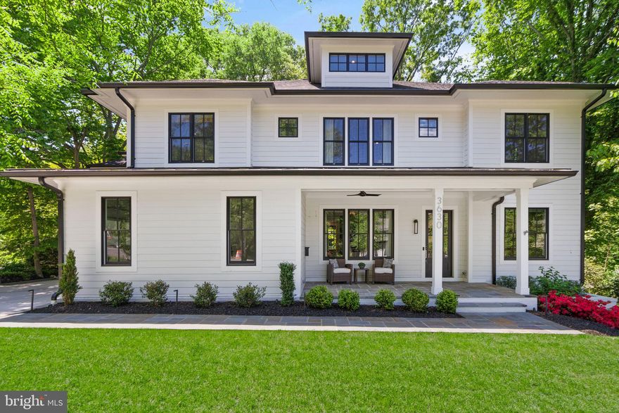 ***PRICE IMPROVEMENT***BETTER THAN NEW, TRANSITIONAL STYLE HOME nestled on a private cul-de-sac in sought-after Bellevue Forest with an AMAZING BONUS FEATURE for nature lovers and outdoor enthusiasts of all ages: there is direct access from the backyard to Gulf Branch Nature center and its walking paths and streams - access without even crossing the road. Less than 2 years old, this custom home features 7 bedrooms and 7 bathrooms on 4 levels with 7,125 sq. ft. of finished living space situated on a large, 17,023 square foot lot and 3-CAR GARAGE, ELEVATOR ROUGH-IN!  You will be awed by this stunning home, built by popular builder M-R Custom Homes, featuring over 300K in improvements including upgraded lighting, window treatments, custom-built climate-controlled wine room, extensive hardscaping and professional landscaping, underground irrigation system, fine finishes, and decorator touches throughout! Stepping in to the foyer your eyes are immediately be drawn to the formal dining room with its dramatic, back-lit, floor-to-ceiling walls of custom shelving. Pass through the French doors directly across the foyer to the study with its wall of custom built-ins and window bench. Cooking and entertaining are a joy in the stunning gourmet kitchen featuring 48" Wolf range with double ovens and pot filler, Wolf Speed Oven/microwave, SubZero refrigerator, large island with seating, 2.5" quartz countertops, custom inset maple cabinetry with lighted upper cabinets, and a separate informal dining room/breakfast room with access to the screened porch. The inviting family room, open to the casual dining room and kitchen, features a custom molding ceiling with shiplap accents and a wood-burning fireplace with gas line. A Butler’s pantry with custom cabinetry and wet bar, full bath with zero threshold glass enclosed shower, and a mudroom with built-in cubbies and benches complete the main level. Proceeding to the second level, you are greeted by the luxurious primary suite featuring a stacked stone accent wall,  large dual walk-in closets, a wet bar, a private office/exercise room, and a gorgeous spa-like primary bath featuring dual sink vanity, frameless heavy-glass enclosed shower with multiple heads, heated marble floor, and a high-end freestanding soaking tub. Three secondary bedrooms, all with en-suite bathrooms, walk-in closets, ceiling fans, and recessed lighting as well as a laundry room with Electrolux washer and dryer complete the second floor. The bonus third floor loft is perfect for a private guest retreat with its wet bar and full en-suite bathroom. The expansive basement showcases a spacious recreation room with wet bar, wine room, gas fireplace, and access to the flagstone patio and fire pit. A theater room, exercise room with rubber flooring and mirrored walls, a light-filled bedroom with access to full bathroom, and abundant storage complete the lower level. The rear screened porch, with separate spacious grilling deck and gas line, off the main level with stairs leading to the expansive lower level flagstone patio make this home a great place to entertain. Ceiling mounted speakers in family room, kitchen, living room, primary bedroom and bath, basement rec room, and screened porch. Gas line and plumbing installed for future outdoor kitchen. Access to Gulf Branch Nature Center trails from the back yard. Within a mile of Washington Golf and Tennis Club, Zachary Taylor Park, Potomac Heritage Trail, and Glebe Road Park with all its nature trails and tennis, and basketball courts, Close to Arlington shops, restaurants, and entertainment.  Minutes to Chain Bridge and Spout Run Parkway. JAMESTOWN ES, WILLIAMSBURG MS, YORKTOWN HS.