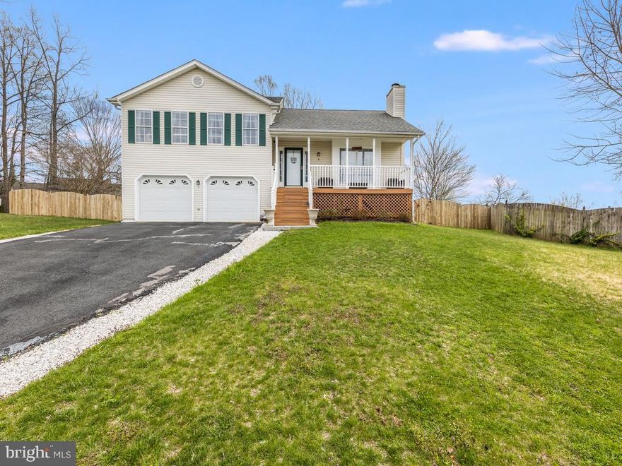 This is the perfect home for you!  End of cul-de-sac location, a large, peaceful backyard, close to everything in the Devon Green neighborhood.  Walk in to a home that has a light and airy feel, plenty of natural light through the windows, and skylights in the dining area that bring in even more natural light. Kitchen has all Stainless appliances, and lots of cabinet space.  Main level living area has a welcoming wood-burning fireplace. The master bedroom has a walk-in closet, built-in shelves, and the additional bedrooms have large closets, and ceiling fans throughout.  The downstairs living area is spacious and great for entertaining, and includes laundry, full bath, and a bedroom.  Bonus 4th lower level area that can be anything you imagine!  New paint, carpet, water heater, sliding glass door and well maintained.  You will walk in to this home, and say "this is it!"  This home won't last long.  Just off of 610, and not far from 95, commuter lots, or even the VRE.