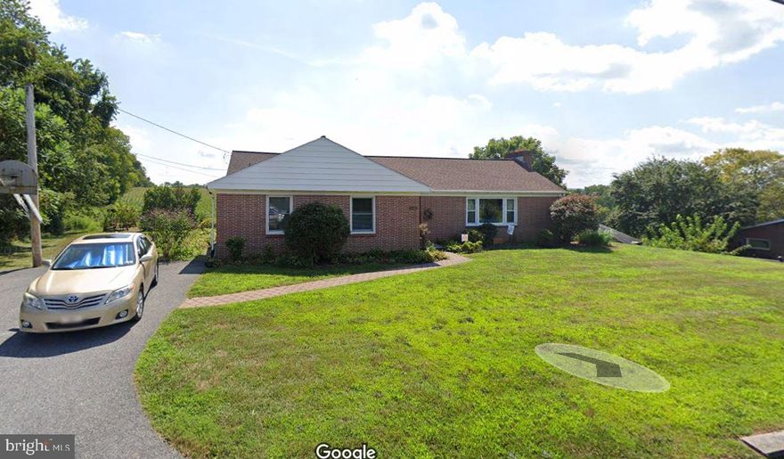 ONE FLOOR LIVING WITH COUNTRYSIDE VIEWS! THIS 3 BEDROOM 1 FULL BATH RANCH STYLE HOME HAS HARDWOOD FLOORS THROUGHOUT, A WOOD FIREPLACE, LARGE WINDOWS FOR LOOKING AT THE GREAT VIEWS! HOME NEEDS SOME WORK AND IS READY FOR SOME ONE TO LOVE AND RESTORE!