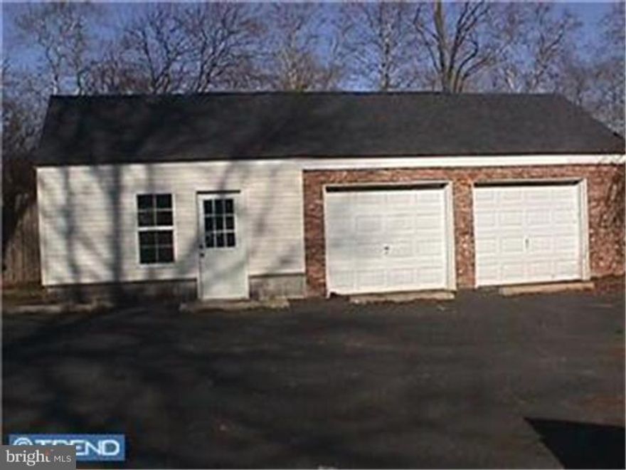 Two car garage for rent.  Two doors with electric openers.  Convenient location just off Route 663.  First, Last and Security due at lease signing.  Storage Only!  No work or business permitted.  Rental is for the 2 garage bays and not the left side of the building with the man door.  Owner is a PA Licensed Real Estate Broker. No Pets. 1st Month, Last Month, & Security Deposit Due with Certified checks at Lease Signing. Anyone over the age of 18 occupying the property must submit a rental application.