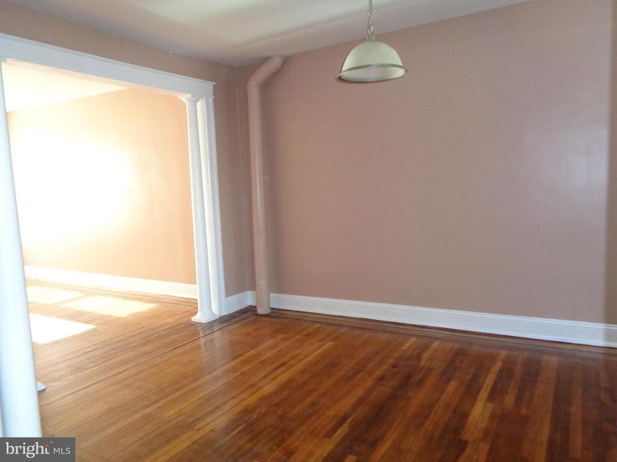 Quick closing!!!  Upgraded solid and spacious 3 levels brick home with 4 bedrooms on upper floor.  Upgraded hardwood floor on all living area, upgraded cabinets, freshly painted. . . . . .close to transportation and local shopping. The street is clean and quiet. Easy access to Rte 40 & 695. Investors are welcome. It won't last. Buy this one and make your friend jealous.