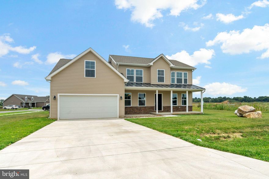 This home is an IMMEDIATE DELIVERY with $10,000 in closing cost assistance, with any lender you want! The 2-story ceilings in the foyer & living room are perfect to showcase your decoration! 
This home features a large front porch, 4 bedrooms & 3 full baths with a 2-car garage and unfinished basement. The main floor features 2 story ceilings in the family room, a main level bedroom & full bathroom, spacious kitchen with soft close cabinets/drawers, granite and stainless-steel appliances, a formal dining room and a formal living room/office. The upstairs features the primary bedroom with a large walk-in closet, large primary bathroom with a walk-in tile shower, dual vanities, toilet room & linen closet. The second floor also features a linen closet and 2 guest rooms and a guest bathroom. The home has an unfinished walk-up basement with rough-in plumbing & full-size window for a future bathroom and bedroom. This home sits on a corner lot and will have a patio poured out back to expand your entertainment area!

This home is virtually staged.
We just have some finishing touches to complete prior to closing.