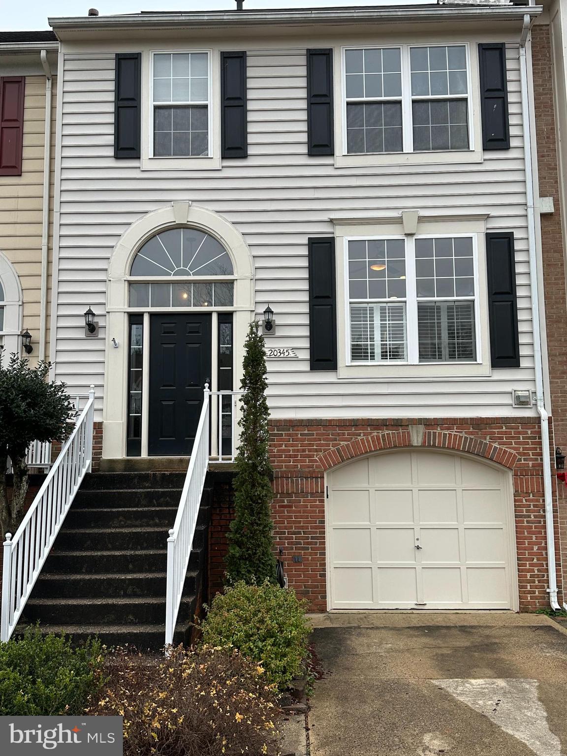 This stunning townhouse features 3 bedrooms and 2 full, 2 1/2 baths in the highly desirable community of Cascades. This home has pristine hardwood floors that flow seamlessly through the main living area. The fully upgraded kitchen offers sleek stainless steel appliances, ample cabinetry, and elegant granite countertops. Relax in the spacious and inviting family room with a connecting den and a cozy wood burning fireplace, ideal for creating  a warm and inviting ambiance. Step outside to an expansive deck, perfect for relaxing, with stairs leading down to a private, fenced backyard. The upper level features a luxurious primary bedroom suite and includes two additional bedrooms and a full bath. The lower level offers a large and inviting recreation room designed for comfort and entertaining with another connecting den and a half bath. This home is a short walk to beautiful Algonkian Park, offering abundant walking paths, scenic views of the Potomac River, and open parkland for outdoor activities. This home is a must see!!