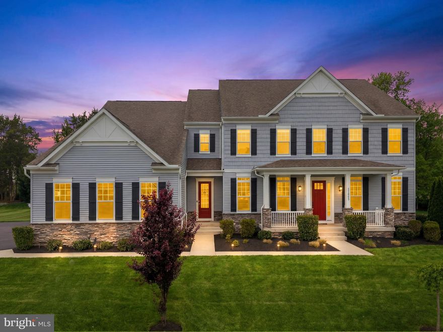 OPEN HOUSE ON SAT MAY 2ND 12PM - 3PM AND SUN MAY 3RD 1PM - 3PM. Situated on a premier 0.57-acre cul-de-sac lot, this 2019-built estate offers an unparalleled living experience spanning over 8,100 square feet of meticulously designed space. The residence makes an immediate impression with its commanding Colonial silhouette and side-load three-car garage, opening into a gallery-inspired interior defined by light oak wide-plank flooring, matte black accents, and soaring ceilings. The heart of the home is the great room, where a floor-to-ceiling black marble fireplace serves as a stunning focal point, framed by a wall of windows that flood the home with natural light and invite the outdoors in. The kitchen is a masterclass in contemporary design, equipped with sleek cabinetry, premium quartz countertops, and a massive waterfall island that transitions seamlessly into the open-concept living areas. Designed for the modern lifestyle, the main level includes a versatile guest suite with a full ensuite bath, ideal for visitors. Upstairs, the primary sanctuary serves as a true retreat, boasting a spa-inspired bath with a freestanding soaking tub, a seamless glass shower, and dual designer vanities. Every secondary bedroom is a private oasis, each thoughtfully paired with its own beautifully appointed ensuite bathroom to ensure comfort for family and guests alike. The home’s lifestyle potential extends to the expansive walk-up lower level, a versatile space perfectly suited for a state-of-the-art home theater, private gym, or recreation space. The double-wide doors invite an abundance of natural light into the space. Outside, the flat backyard opens to a deck with custom lighting and offers a rare level of privacy and a blank canvas for a custom pool, pavilion, or outdoor kitchen. Meticulously maintained and featuring high-end upgrades such as a comprehensive water treatment system and sprinkler system, this property offers the peace of mind of recent construction. Located just minutes from the Silver Line Metro, Reston Town Center, and the Dulles tech corridor, this is a rare opportunity to own a modern masterpiece in the heart of Herndon’s most sought-after landscape.
