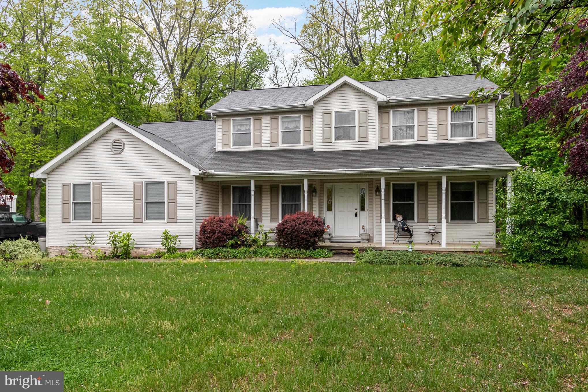 Buyers will love this well kept home in Lake Marburg Neighborhood. This home features 3 bedrooms and 2.5 baths. The first floor features a lovely primary suite with large walk in closet and primary bath with a jet tub. The first floor also has a beautiful formal dining room, spacious living room and kitchen with breakfast nook. Upstairs, you will find 2 additional bedrooms and a full bath. The exterior has a beautiful patio to enjoy the quite solitude of a 1 acre lot! Do not miss your chance to call this slice of heaven your own!