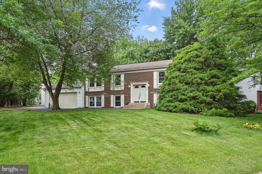 5-bedroom, 3-bath split-level home with an addition, situated on a desirable corner lot with a 2-car garage!

The 2025 refinished hardwood floors on the main level will wow you in the living room, dining room, kitchen, hallway, and foyer. This level also includes 3 bedrooms, including an owner’s suite with an ensuite bath, and a hall bathroom. The ensuite bath features a Solatube for natural light and a custom shower with four wall sprayers. The kitchen offers Silestone countertops and hickory cabinets, and connects to the dining room, which has a walk-out to the rear deck.

The lower level includes two additional bedrooms, a full bath with dual shower heads, a spacious recreation room with a wood-burning fireplace, a utility/laundry room, and walk-up access to the garage.

Off the back of the garage, you’ll find a stunning 18’x30’ addition with separate climate control, oak hardwood floors, a mirrored wall, a wall of windows, four skylights, ceiling fans, and a sliding glass door leading to the backyard. With rough-in plumbing for a wet bar, this space offers endless possibilities—use it as a family room, dance studio, or convert it into an Au Pair or guest suite.

Energy-efficiency upgrades include insulated vinyl siding, e-shielding in the attic, and a ridge-vented roof. Additional improvements include fresh paint (2025), new carpet (2025), and a water heater (2020).

The fully fenced backyard includes a large deck—perfect for outdoor entertaining or relaxing evenings.

Enjoy access to scenic walking trails, playgrounds, and community parks, with optional memberships available at Fox Mill Swim Club and Pinecrest Swim & Tennis Club. You'll be just minutes from Fairfax County Parkway, the Dulles Toll Road, and 1.5 miles from the Herndon Metro Stop! Shopping and dining are all nearby—plus, the home is within walking distance to Fox Mill Elementary.

Welcome Home!