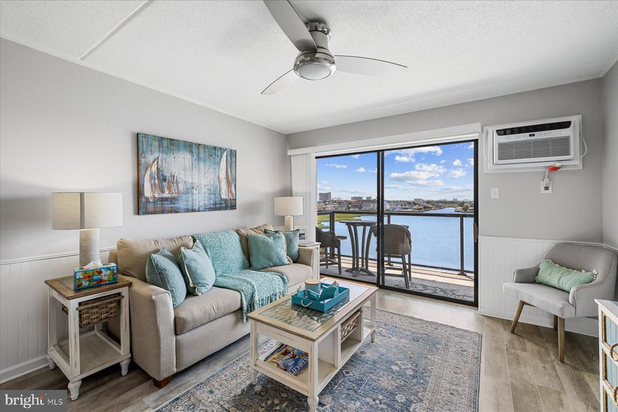 Welcome to Harbor Sails — a rarely available top-floor bayfront gem offering panoramic, unobstructed views of Assawoman Bay! This beautifully updated and fully furnished condo is the ultimate coastal retreat, perfectly located just minutes from the beach, boardwalk, restaurants, and shopping. The open-concept layout is filled with natural light and showcases stunning bayfront scenery throughout. The modern kitchen features granite countertops, stainless steel appliances (including a built-in microwave and new disposal), and crisp white cabinetry, ideal for entertaining or enjoying a quiet night in. Step onto your spacious private balcony and take in breathtaking sunsets over the water. Additional highlights include brand new luxury vinyl plank flooring, in-unit washer and dryer, ample storage, and convenient elevator access to the fifth floor. Community amenities include a swimming pool and tennis court, offering the perfect blend of relaxation and recreation. Whether you’re looking for a serene second home, a full-time waterfront residence, or a high-demand investment property, this is an opportunity you won’t want to miss. Schedule your private tour today and experience the magic of Harbor Sails living!